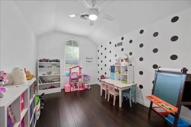 a room with furniture and wooden floor