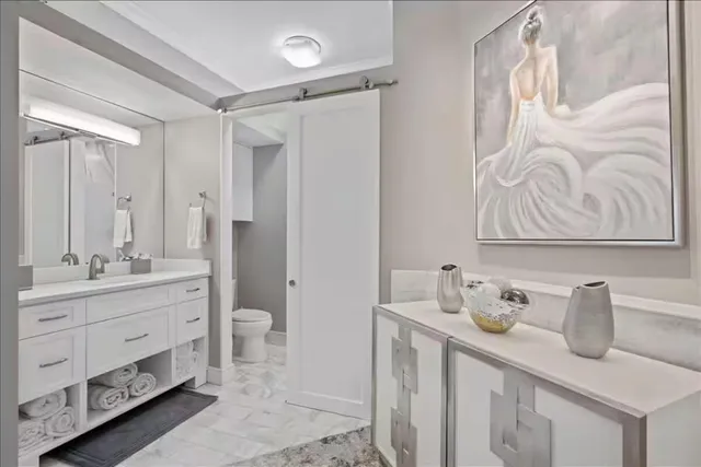 an outdoor space with swimming pool and furniture