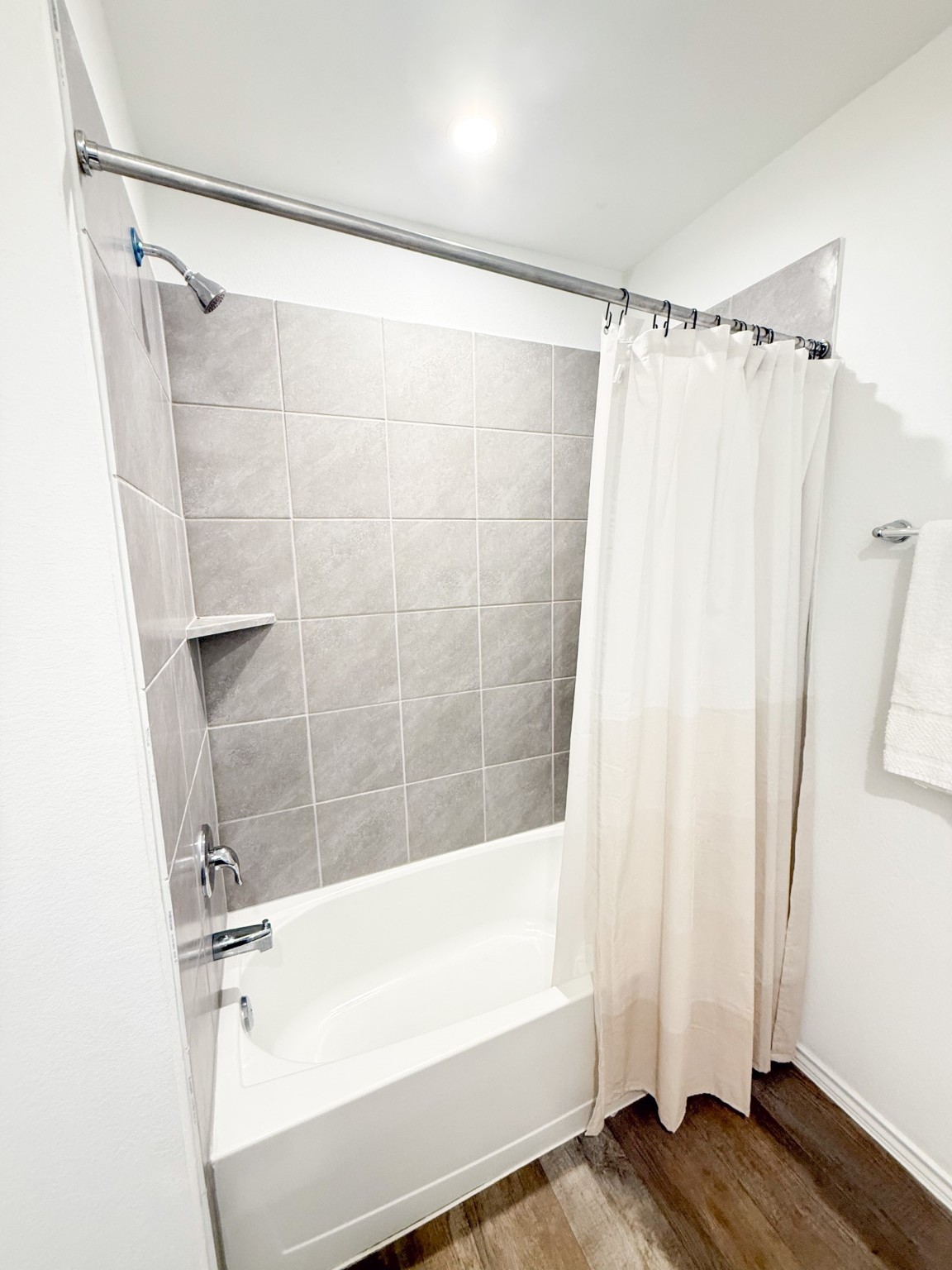 3611 Ashford Grove Fulshear, TX 77441 - Photo 17 of 20 a bathroom with a shower and a tub