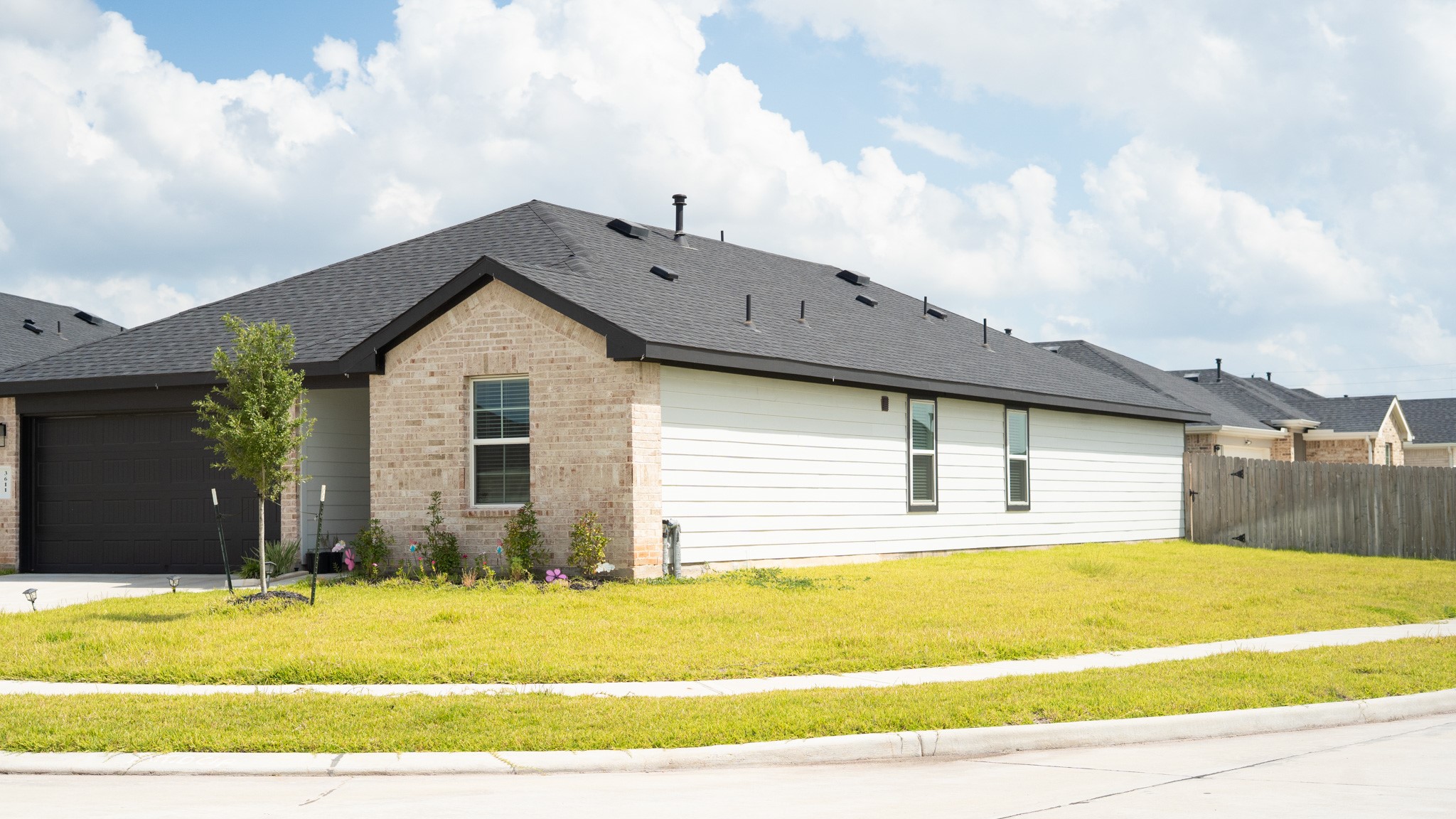 3611 Ashford Grove Fulshear, TX 77441 - Photo 2 of 20 a view of a house with a swimming pool