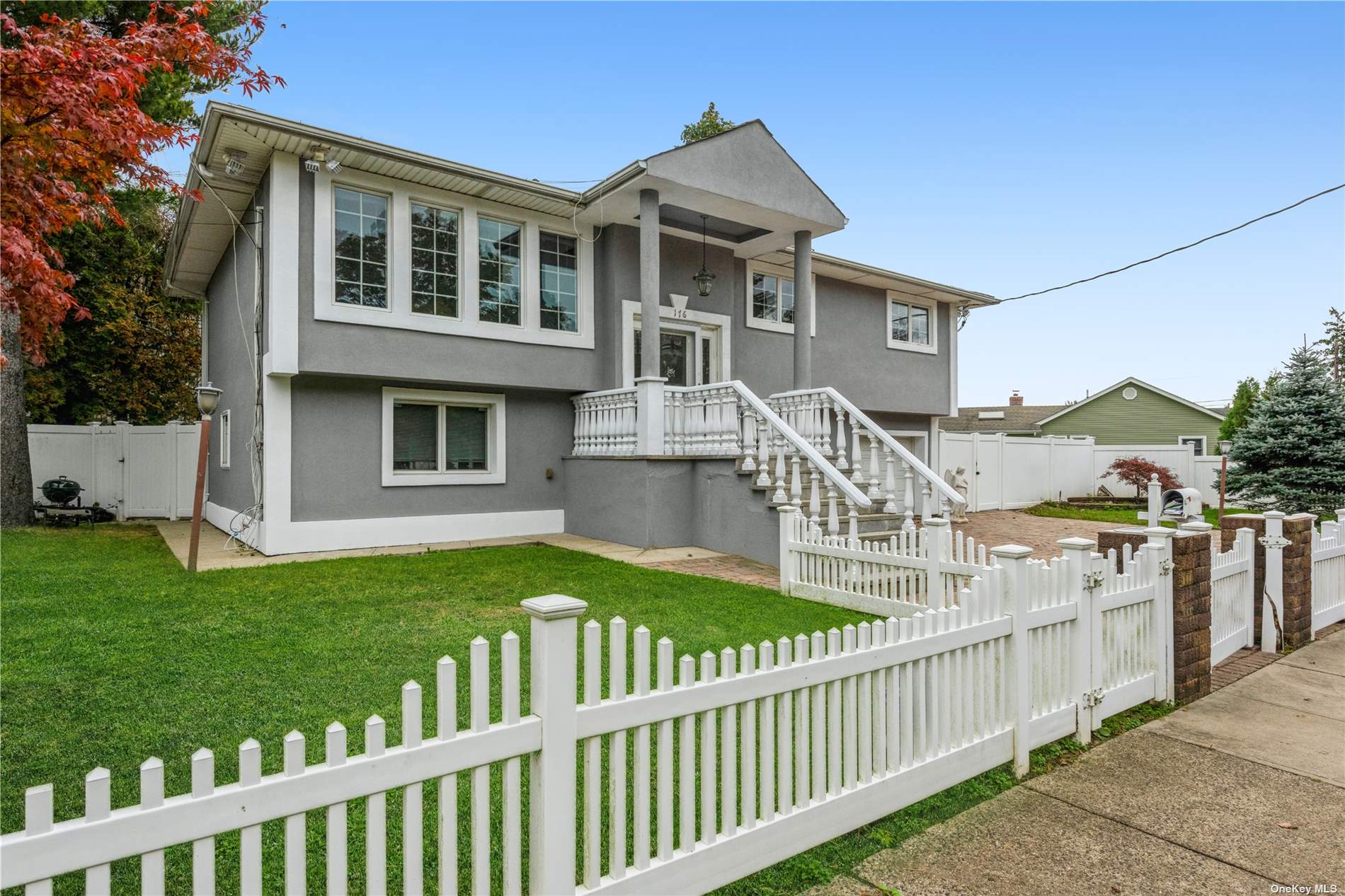 176 Radcliffe Road Plainview, NY 11803 - Photo 1 of 1 a view of a house with a wooden deck