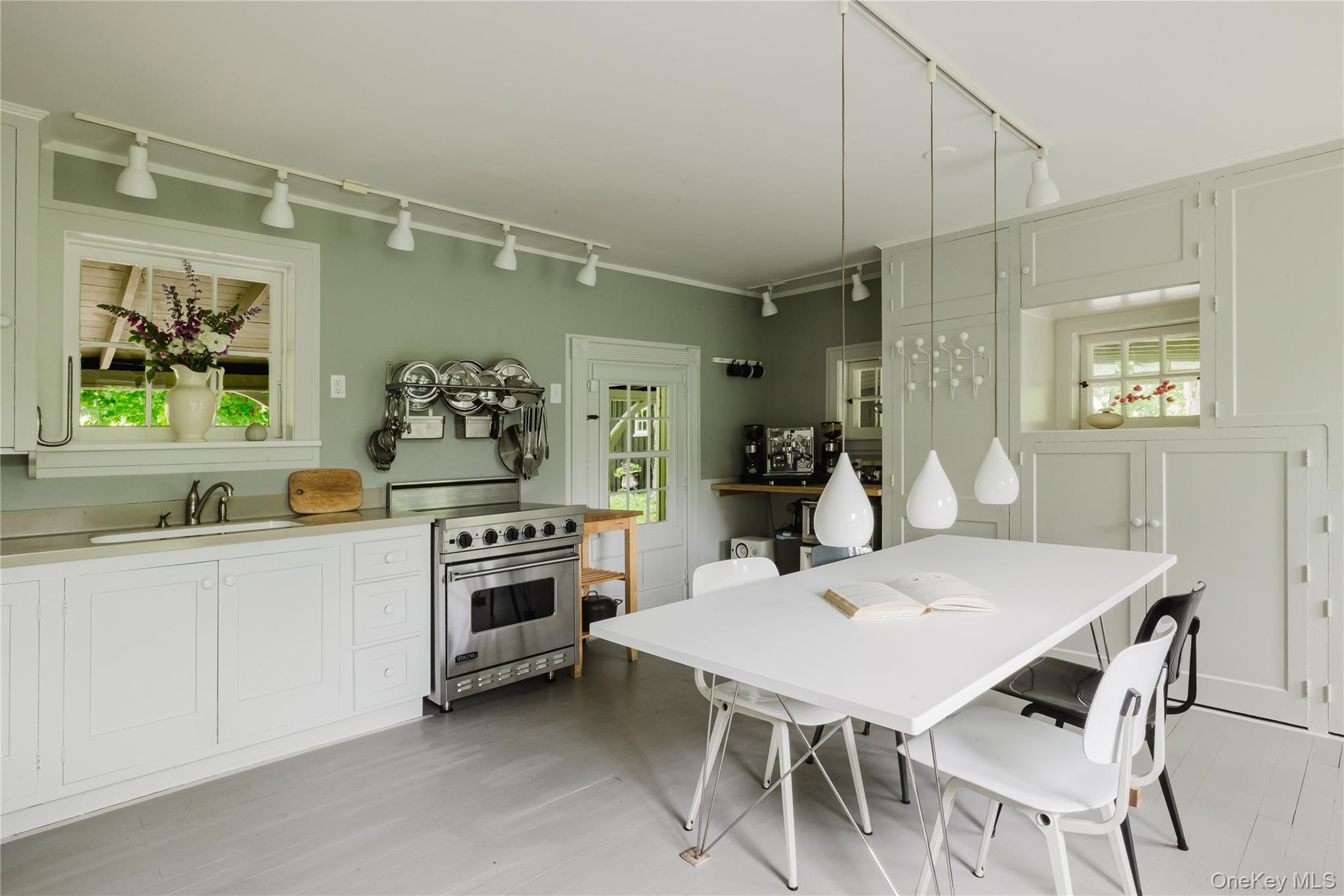 88 Mac Brown Road Claverack, NY 12513 - Photo 17 of 49 a kitchen with a stove a table and chairs