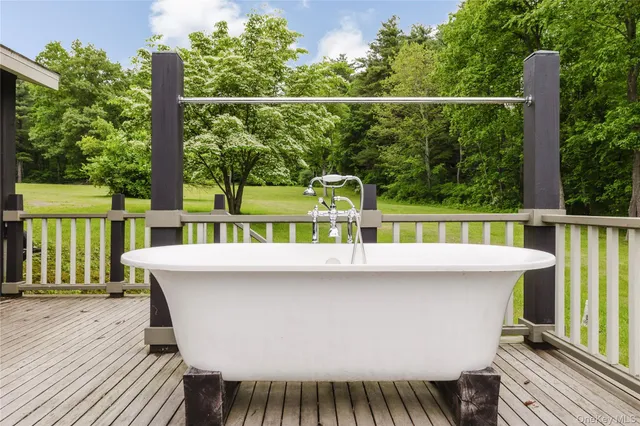 a front view of a house with a street