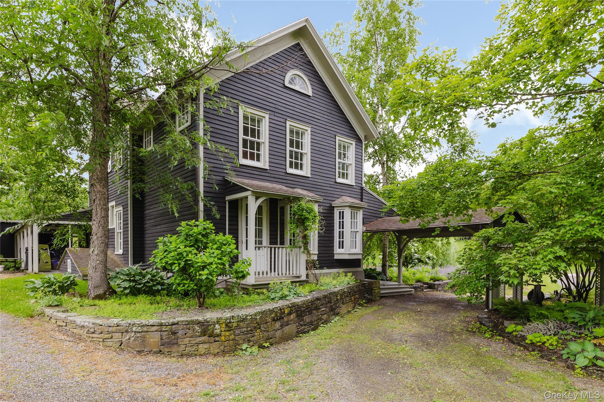 88 Mac Brown Road Claverack, NY 12513 - Photo 3 of 49 a front view of a house with a yard and potted plants