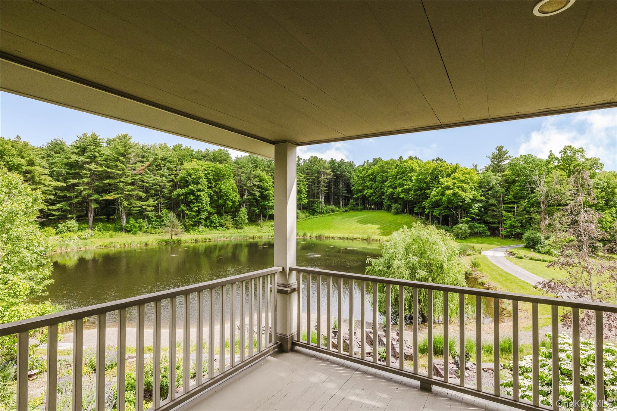 88 Mac Brown Road Claverack, NY 12513 - Photo 32 of 49 a view of lake from balcony