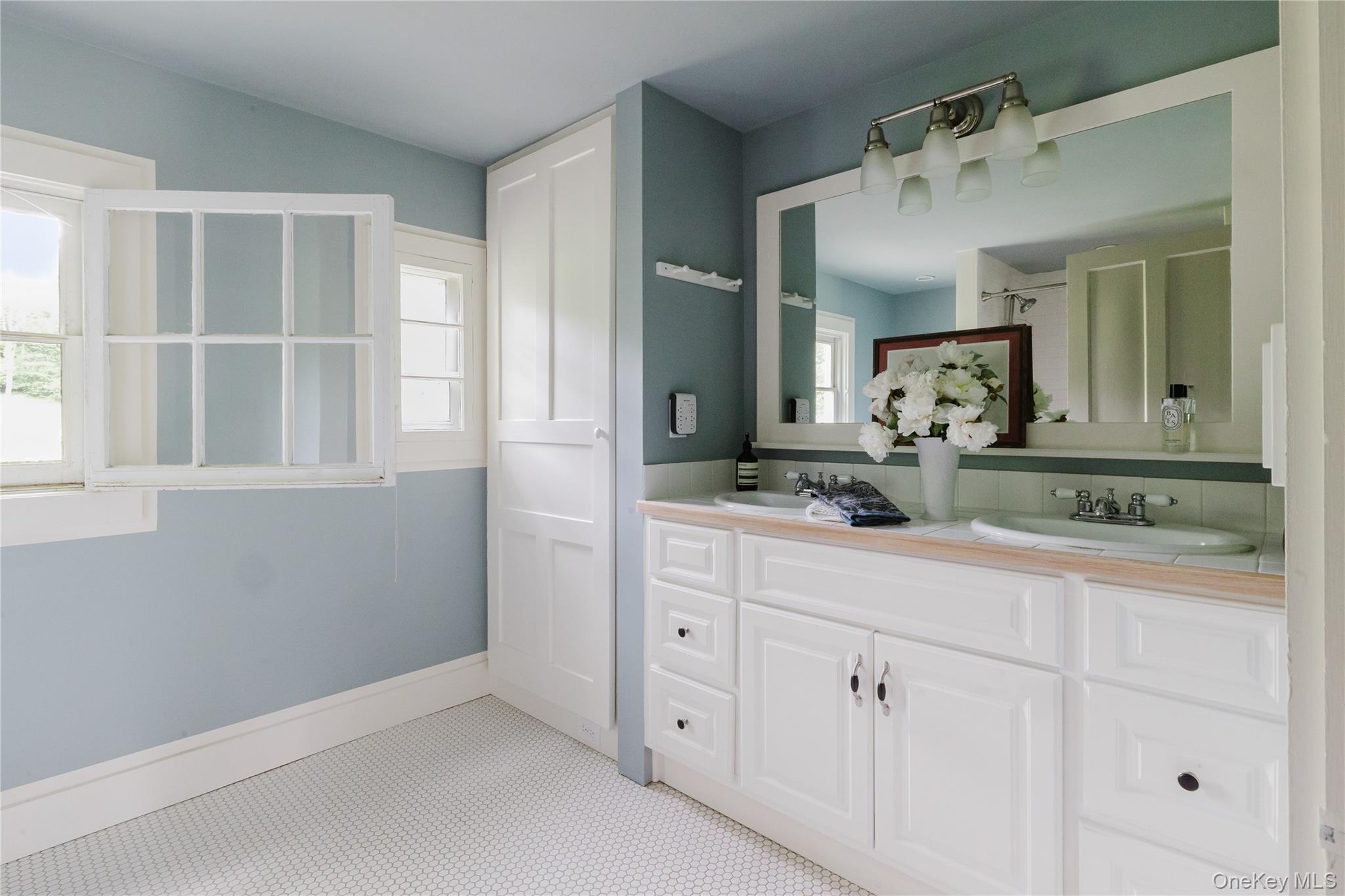 88 Mac Brown Road Claverack, NY 12513 - Photo 33 of 49 a bathroom with a granite countertop sink mirror and vanity