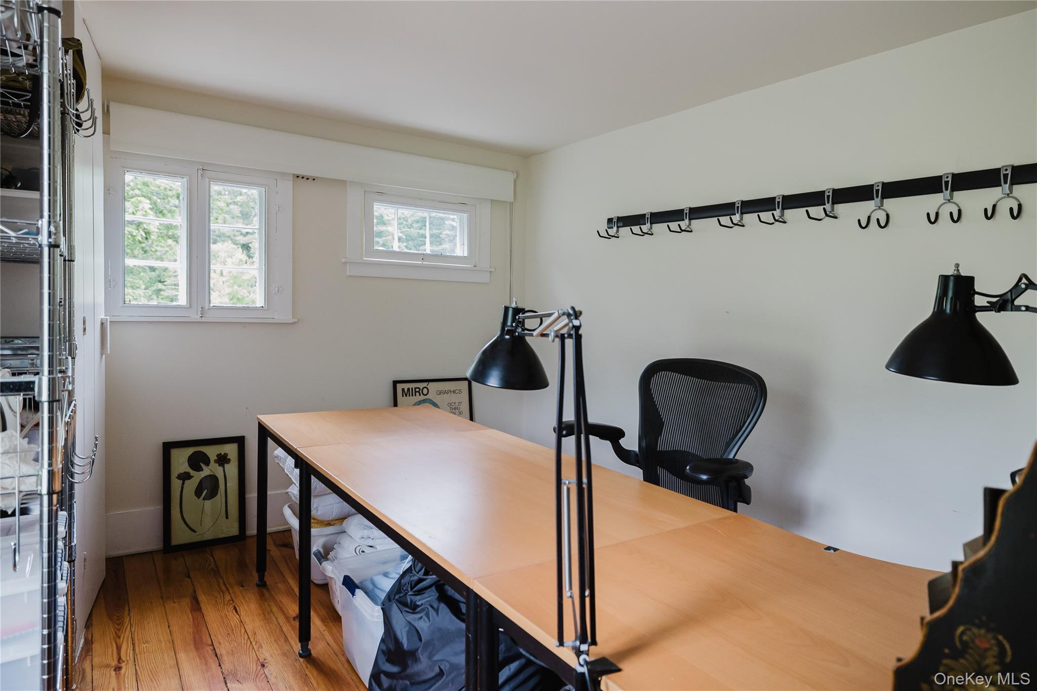 88 Mac Brown Road Claverack, NY 12513 - Photo 37 of 49 a bedroom with bed and a chandelier