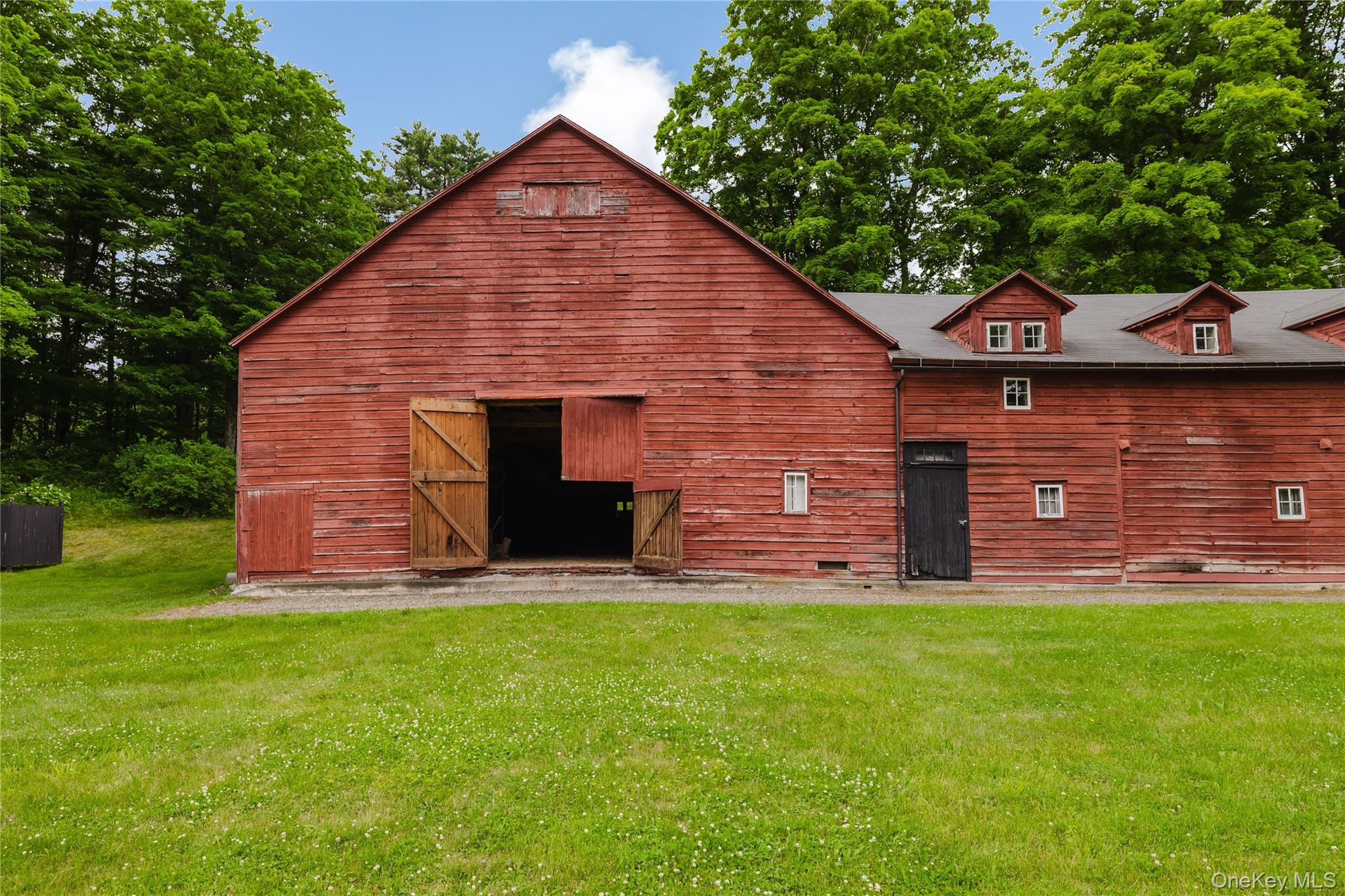 88 Mac Brown Road Claverack, NY 12513 - Photo 41 of 49 a view of a brick house with a yard