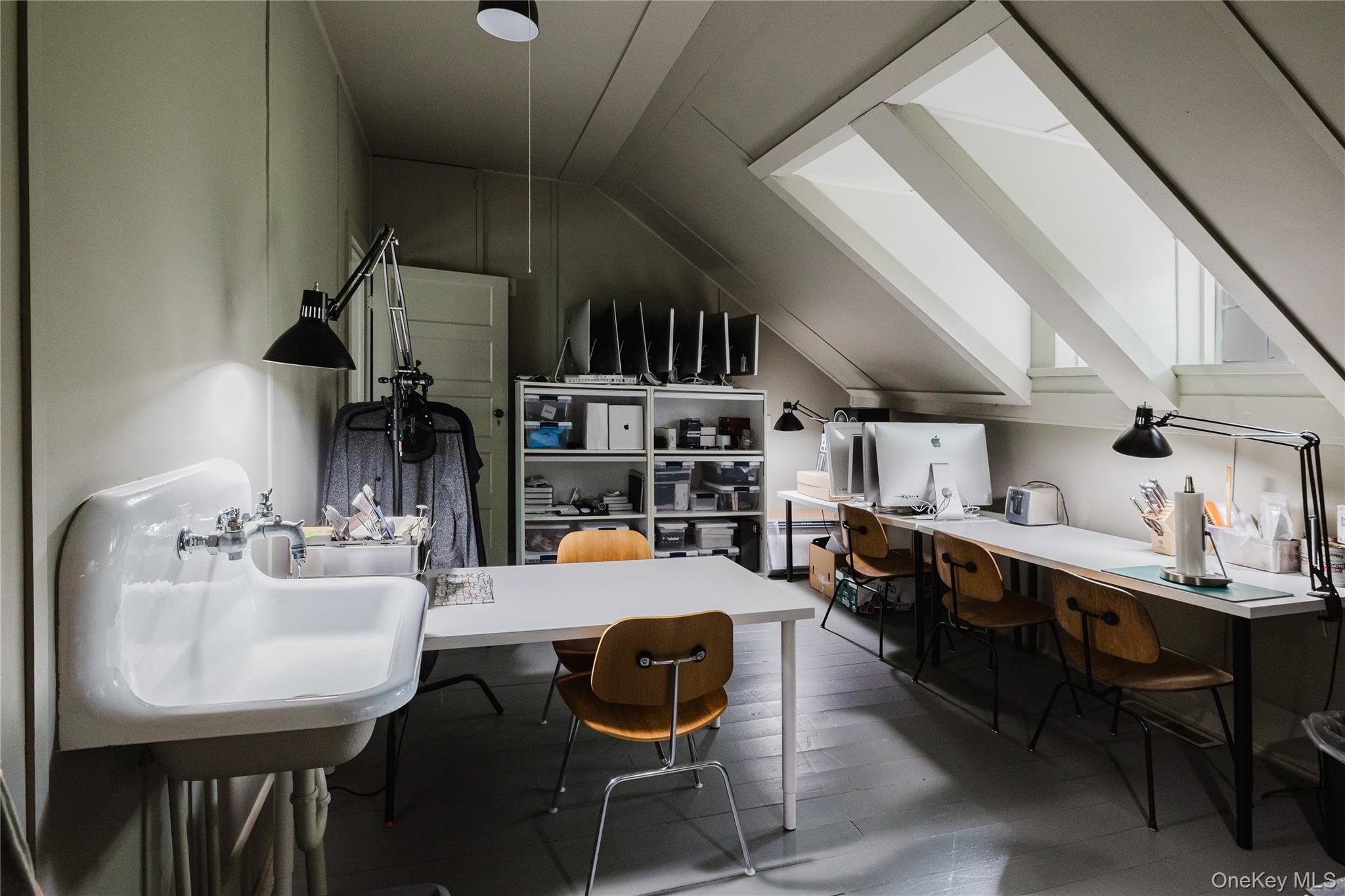 88 Mac Brown Road Claverack, NY 12513 - Photo 45 of 49 a room with stainless steel appliances kitchen island granite countertop a table chairs and a refrigerator
