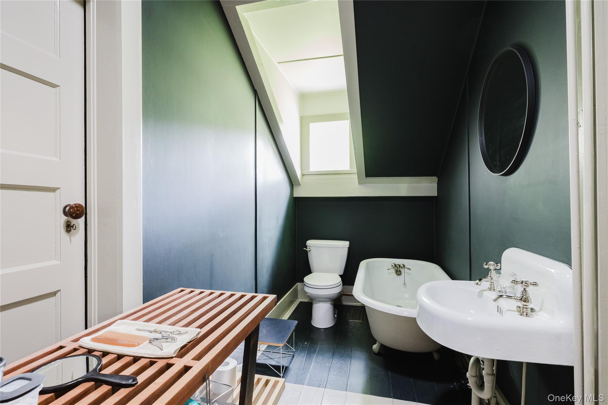 88 Mac Brown Road Claverack, NY 12513 - Photo 47 of 49 a bathroom with a sink a toilet and a mirror