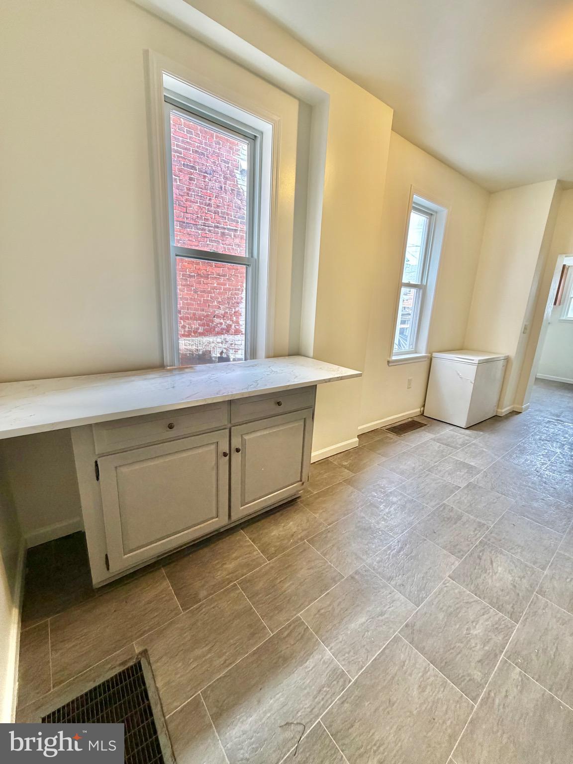 1211 West Poplar Street York, PA 17404 - Photo 11 of 38 a view of an empty room with a window