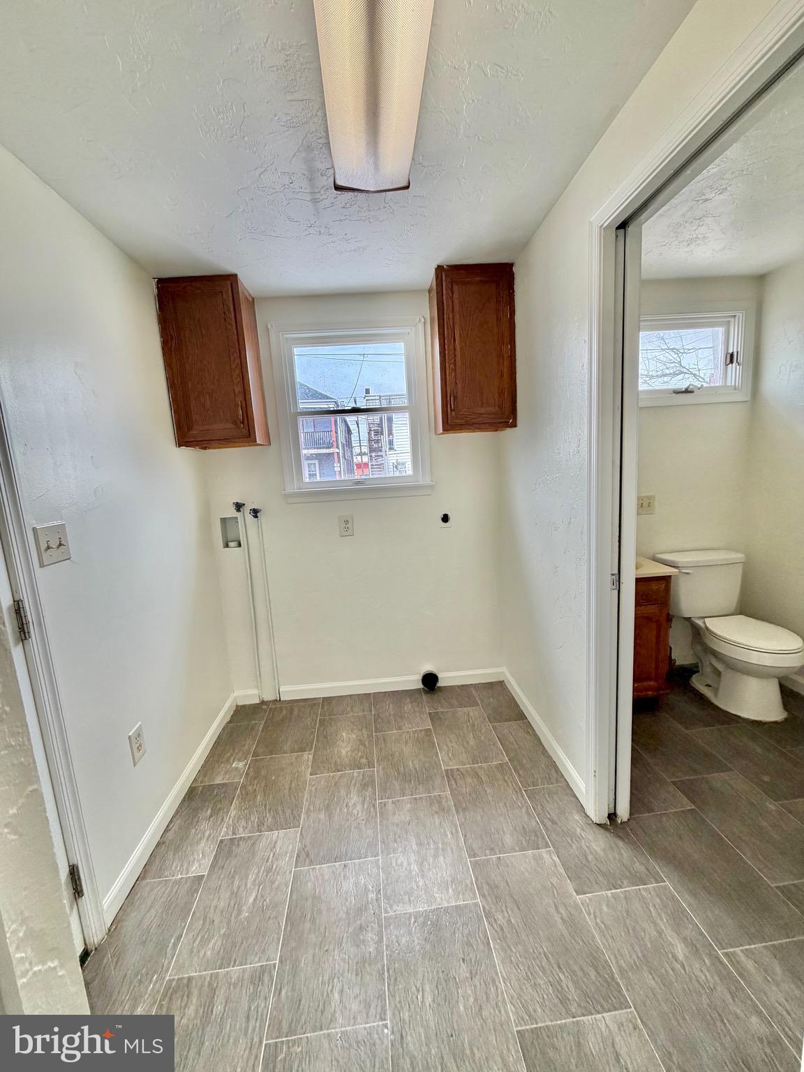 1211 West Poplar Street York, PA 17404 - Photo 15 of 38 a view of a room with wooden floor and cabinet