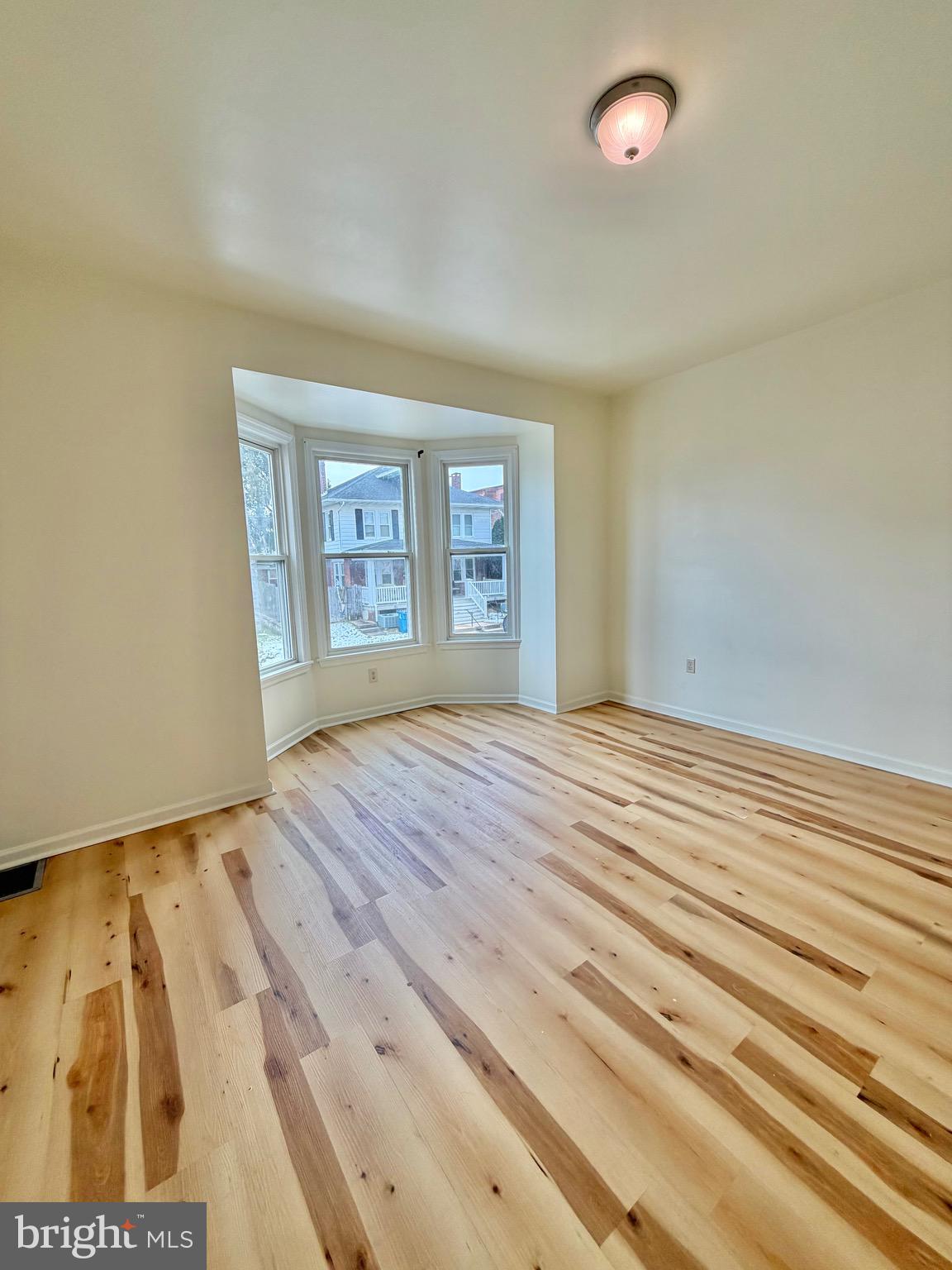 1211 West Poplar Street York, PA 17404 - Photo 26 of 38 a bedroom with a bed and a window