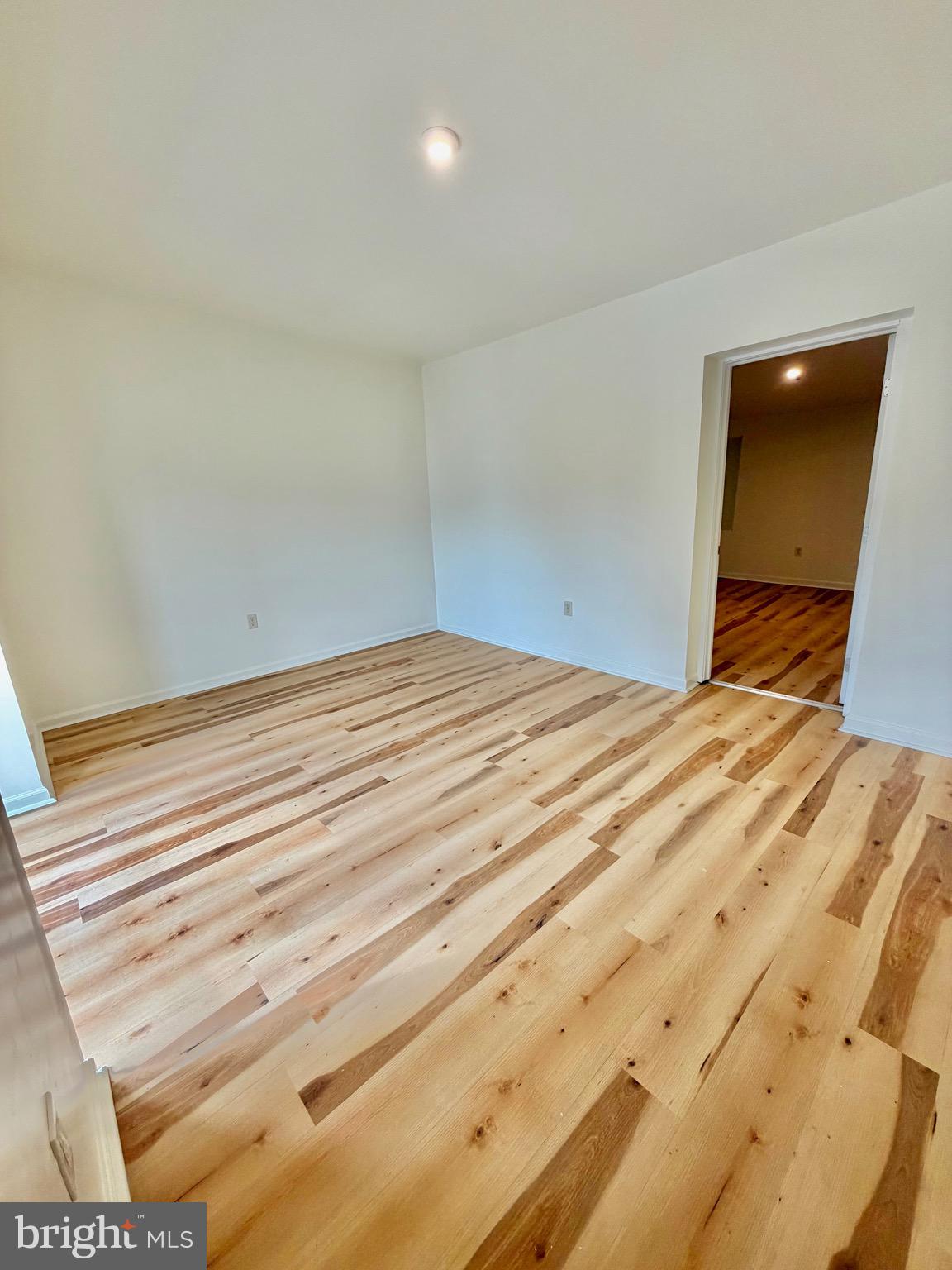 1211 West Poplar Street York, PA 17404 - Photo 33 of 38 a bedroom with a bed and a mirror