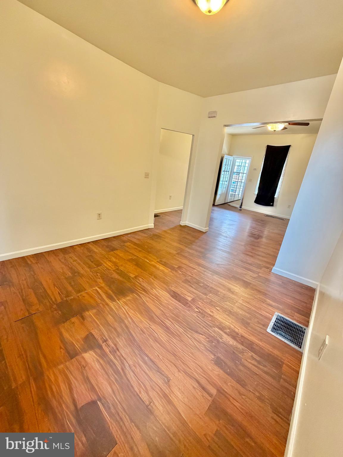 1211 West Poplar Street York, PA 17404 - Photo 6 of 38 a view of empty room with wooden floor