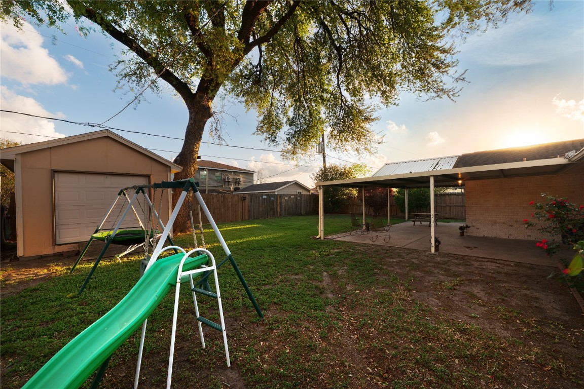 4214 Monitor Street Houston, TX 77093 - Photo 5 of 21 a backyard of a house with table and chairs