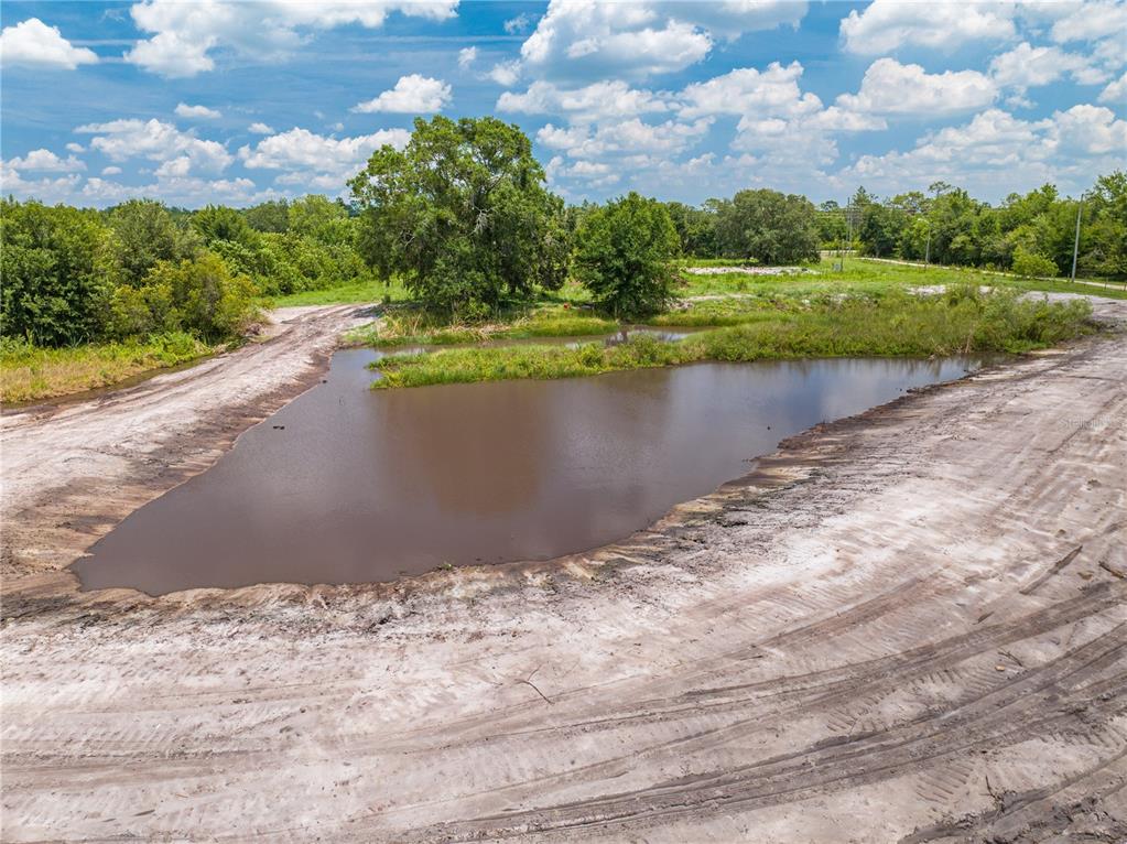 5420 Holopaw Road St. Cloud, FL 34773 - Photo 16 of 16 a view of a lake with a big yard