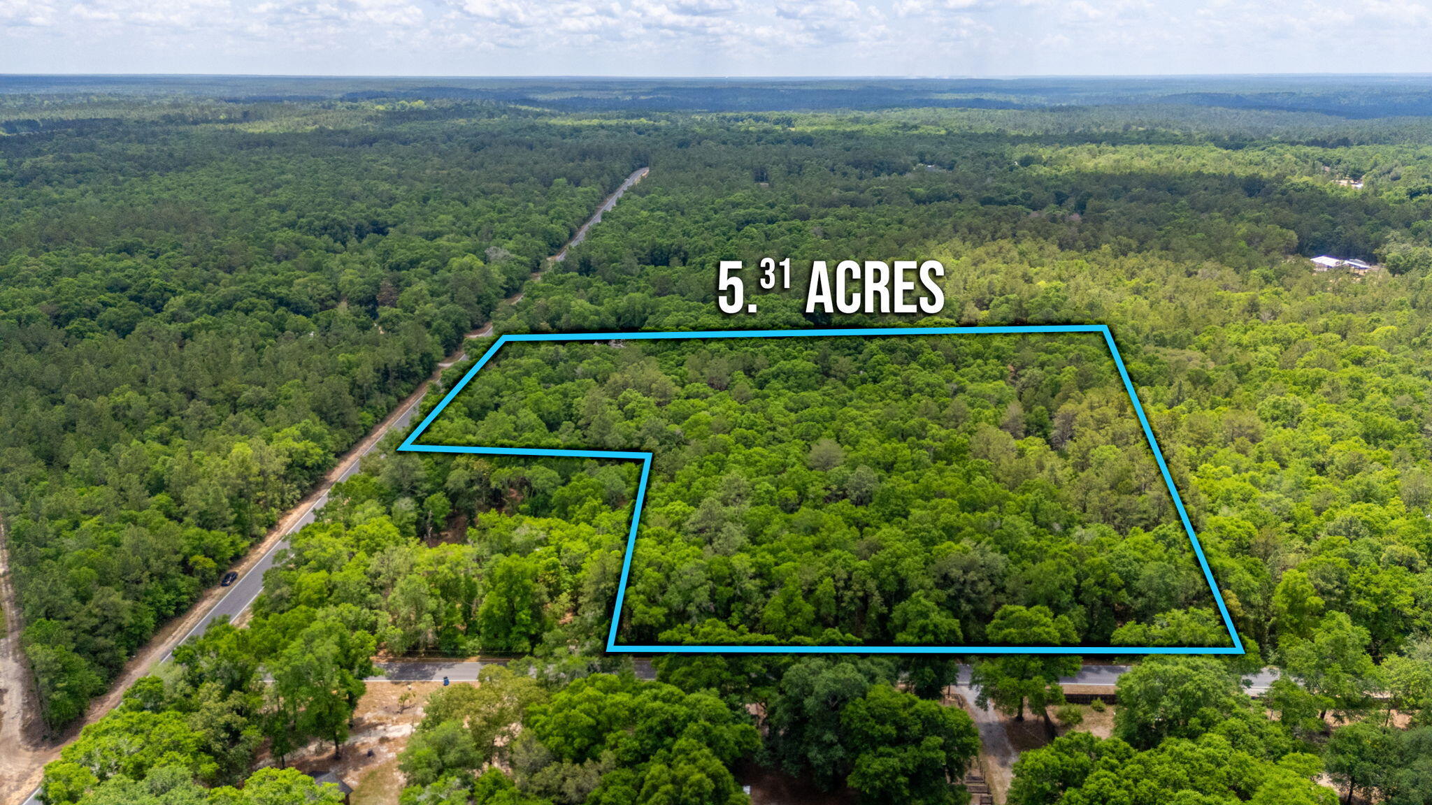 5.31-ac Xx John Nix Road Crestview, FL 32539 - Photo 19 of 22 a view of a sign that is in front of a field