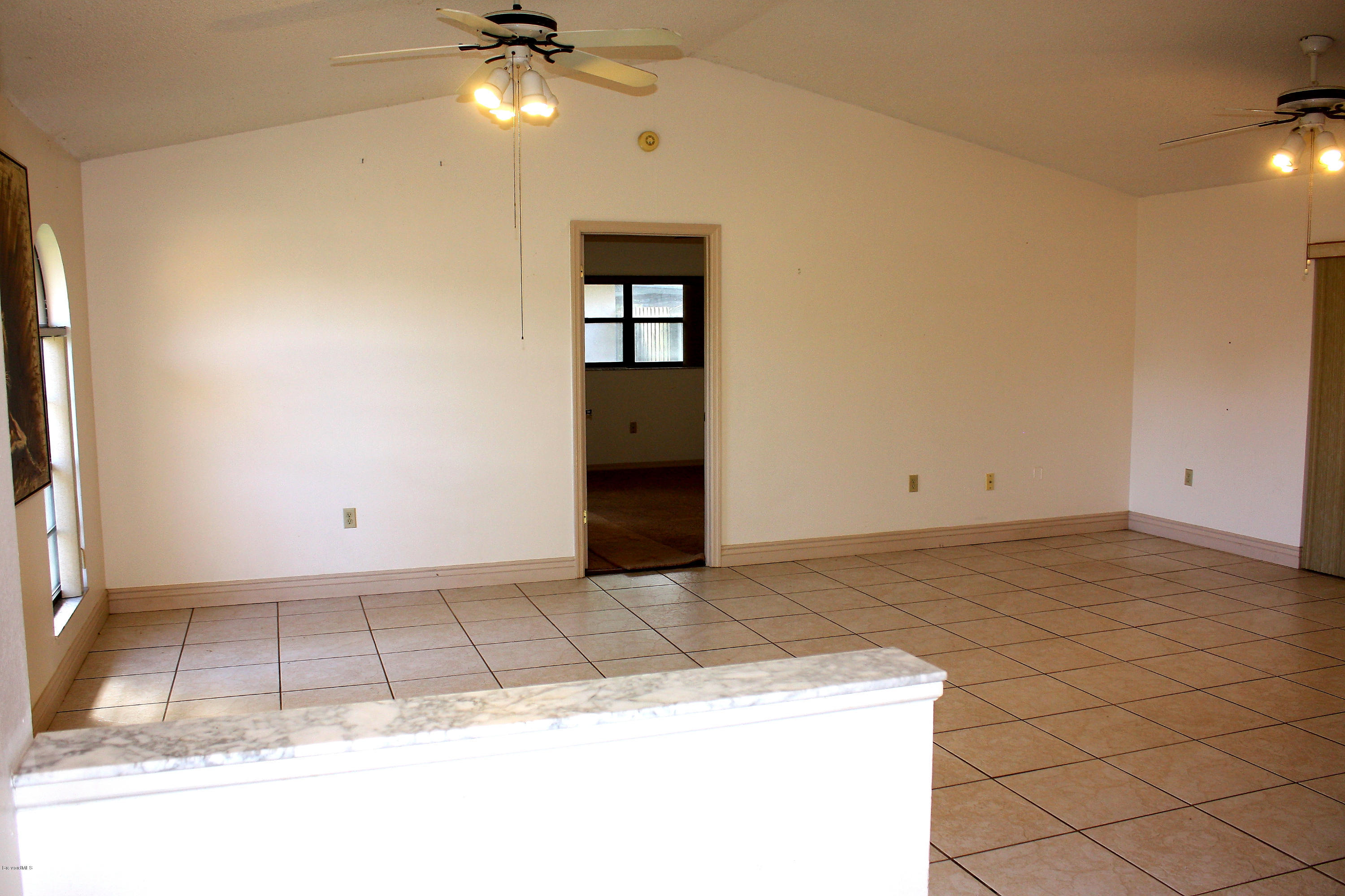 864 Croton Road Rockledge, FL 32955 - Photo 2 of 12 Entrance Foyer & Living Room