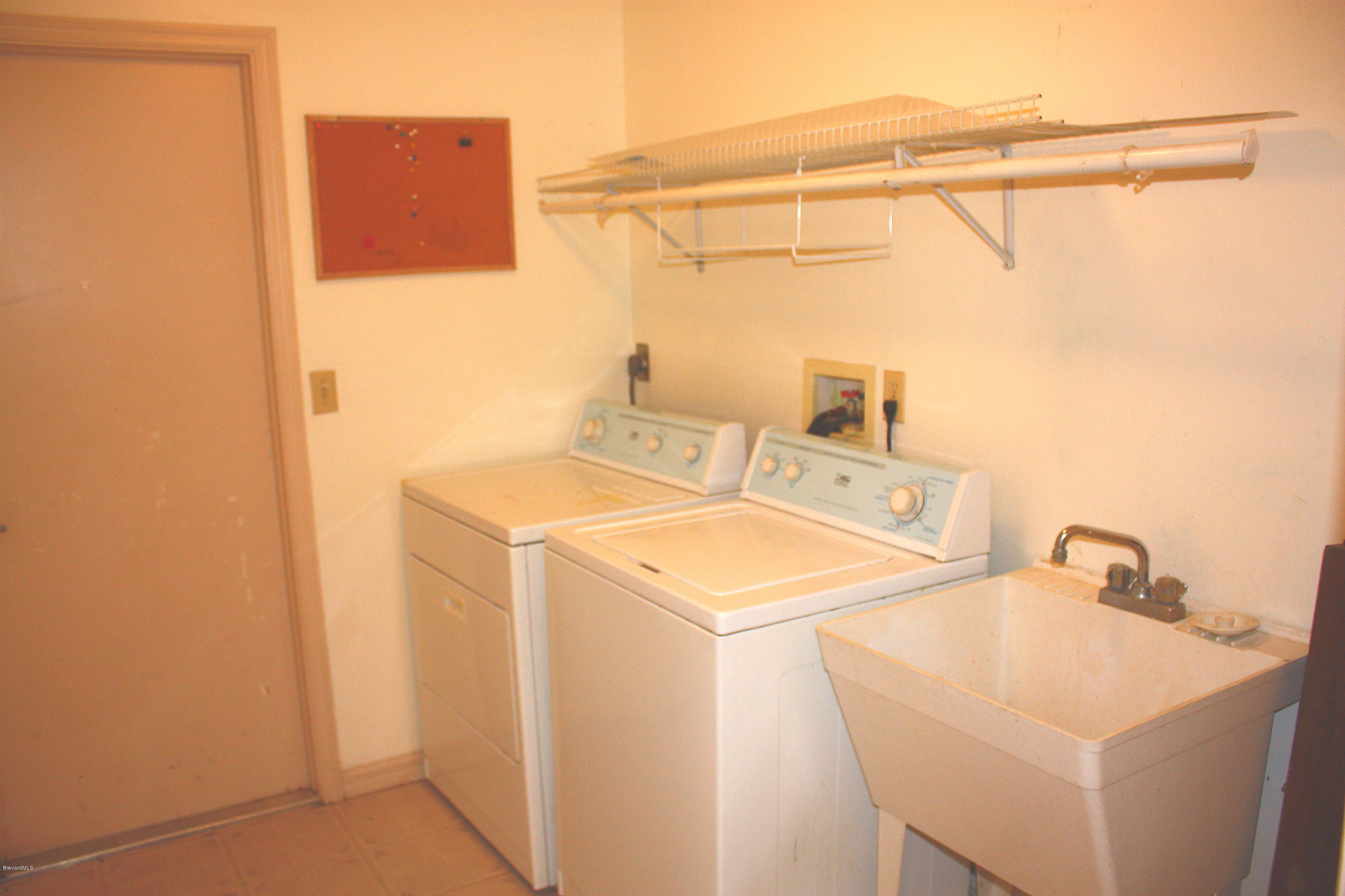 864 Croton Road Rockledge, FL 32955 - Photo 11 of 12 Laundry Room