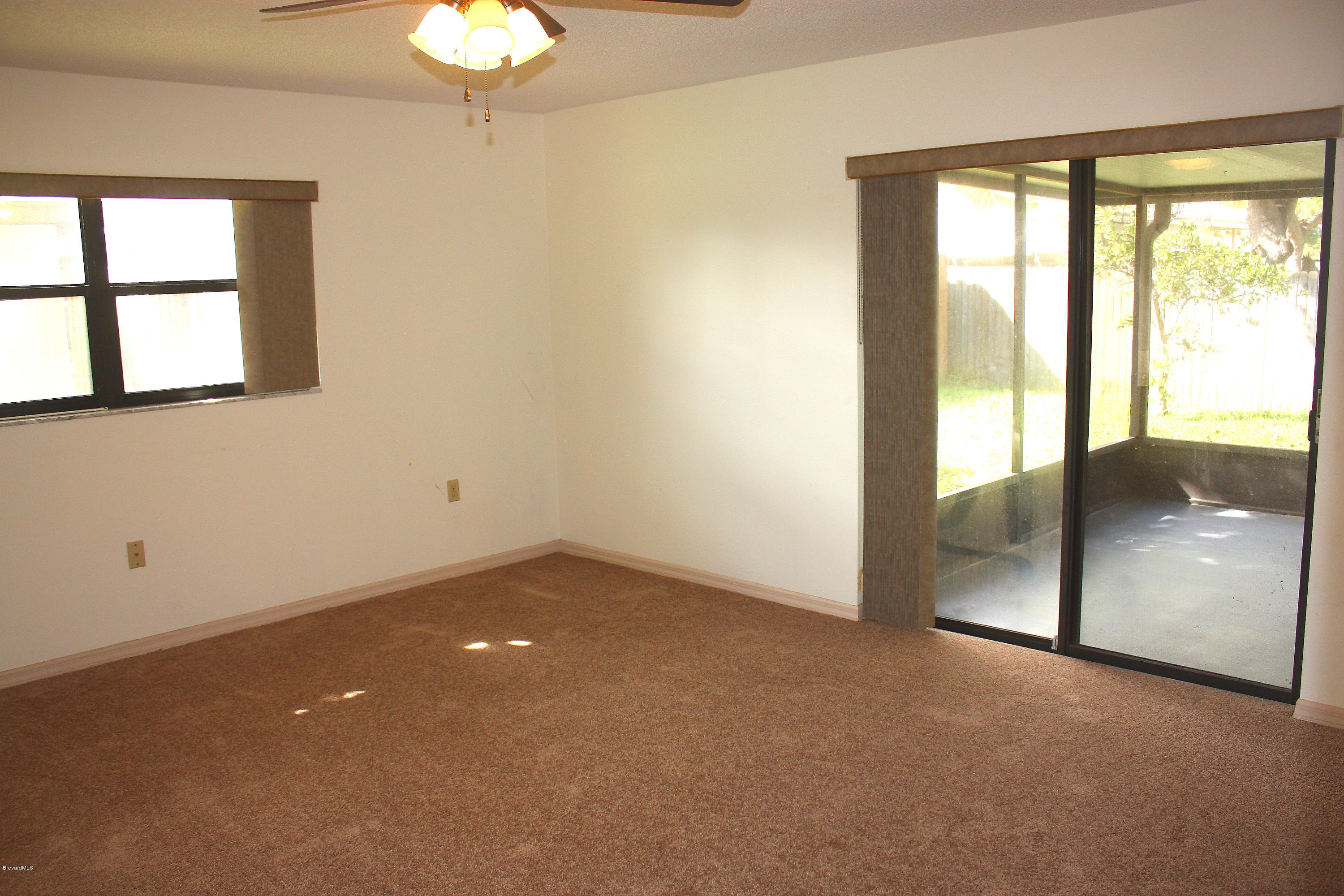 864 Croton Road Rockledge, FL 32955 - Photo 7 of 12 Master Bedroom Sliders
