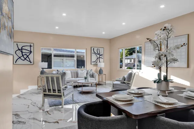 a living room with furniture and view of living room