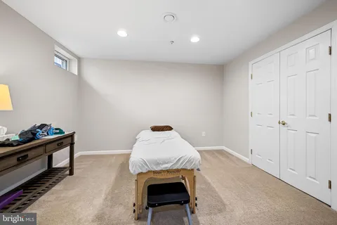 a room with furniture and wooden floor