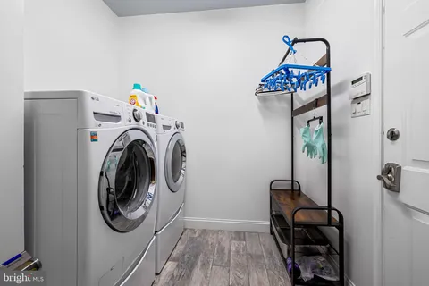 a view of a storage & utility room with washer and dryer