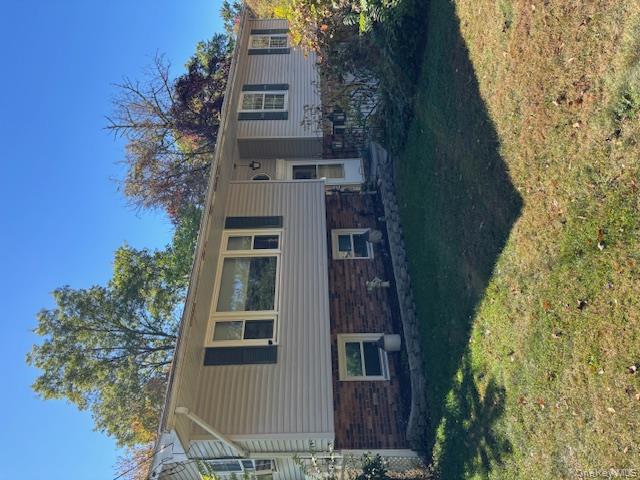 8 Rayland Road Newburgh, NY 12550 - Photo 1 of 1 a front view of a house with a garden