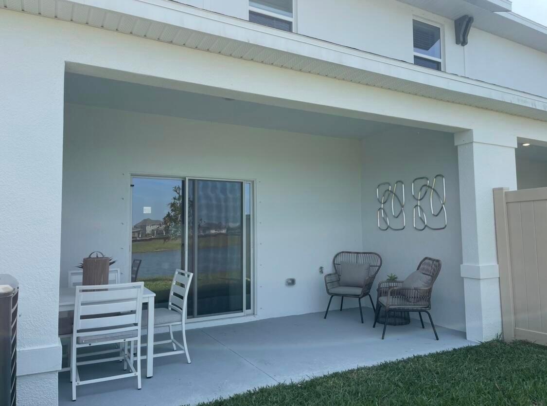 12901 Southwest Forli Way Port St. Lucie, FL 34987 - Photo 14 of 16 a view of dining room with furniture and a rug