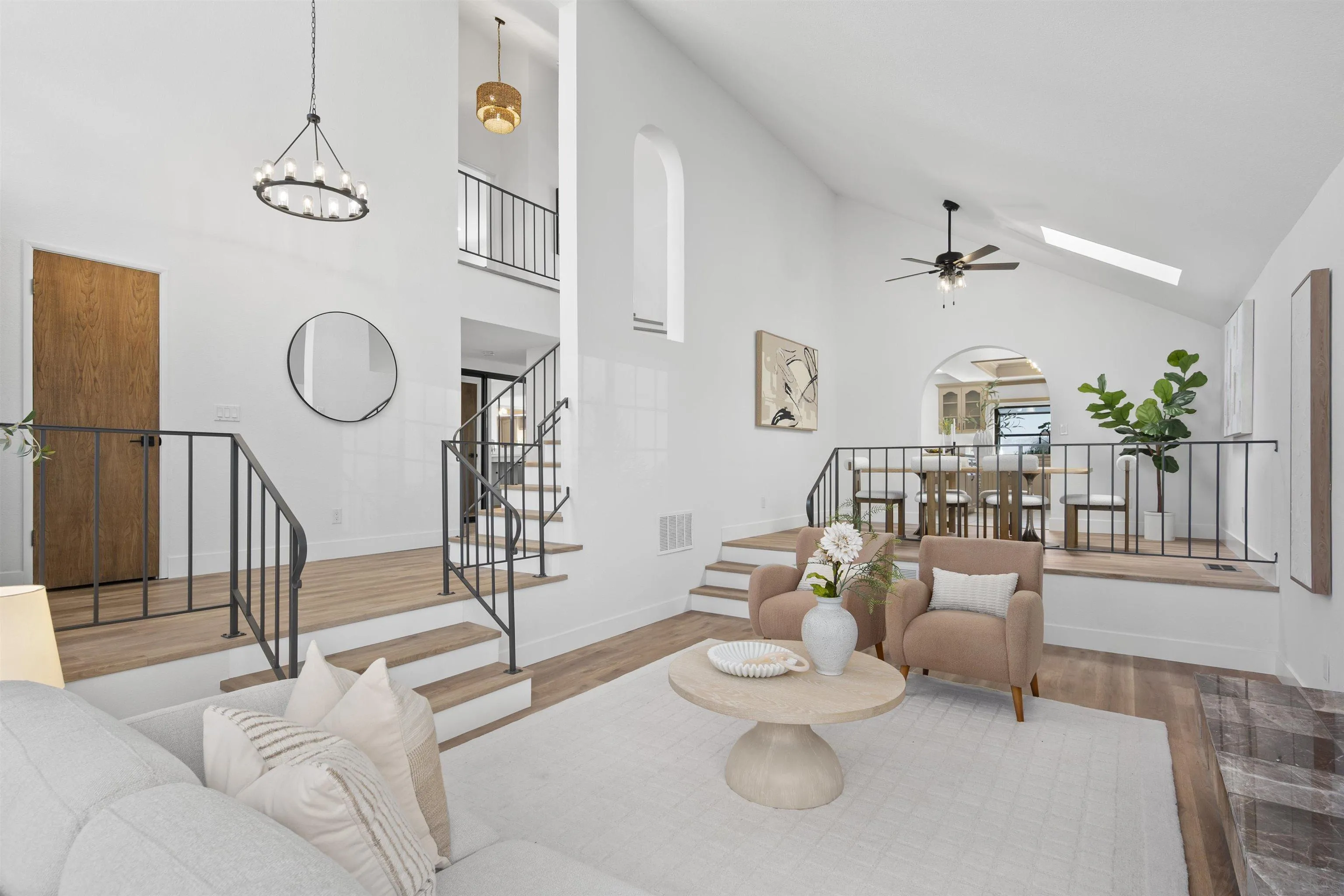 2431 Wilbur Avenue San Diego, CA 92109 - Photo 12 of 56 a living room with furniture a rug and white walls