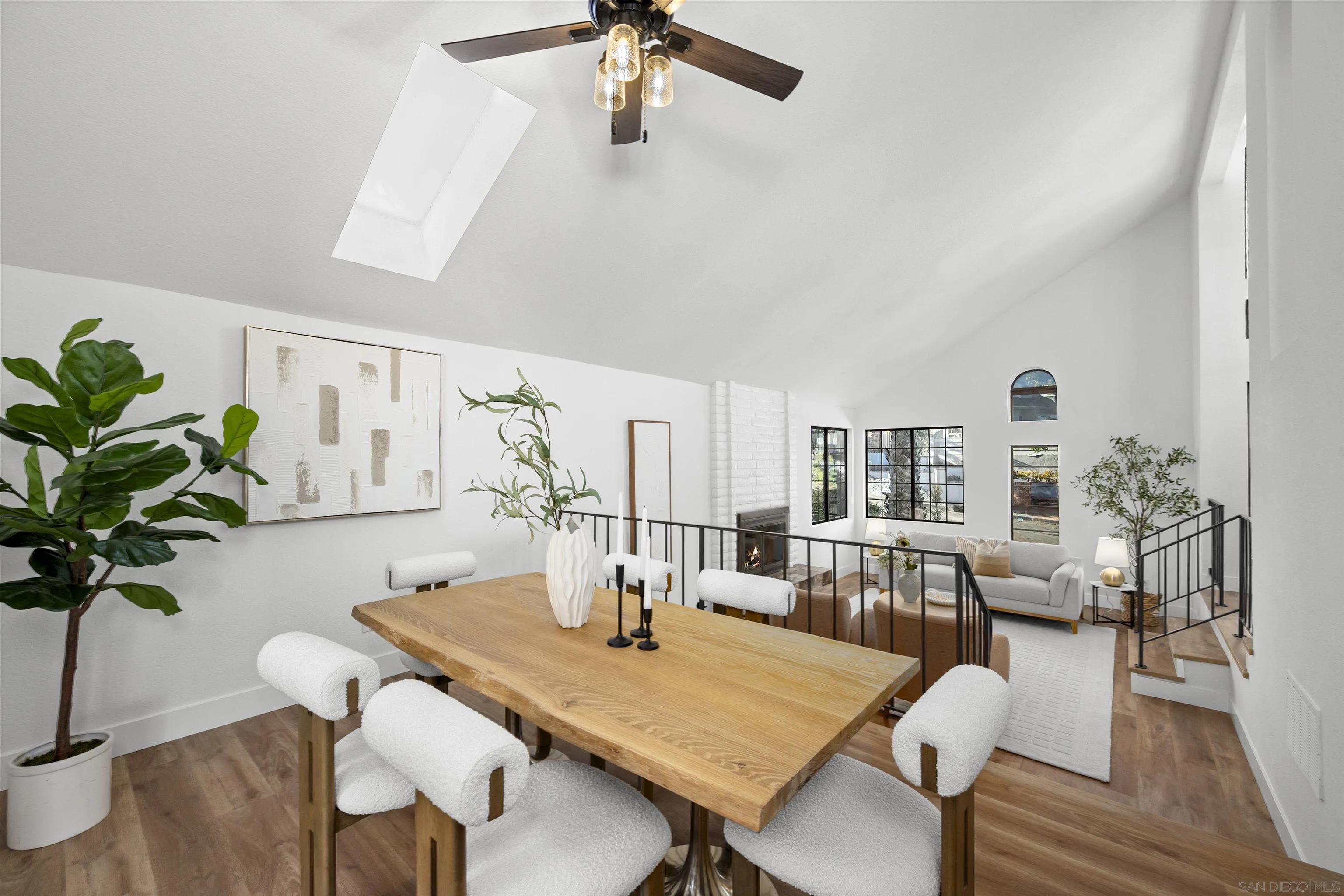2431 Wilbur Avenue San Diego, CA 92109 - Photo 16 of 56 a view of a dining room with furniture and wooden floor