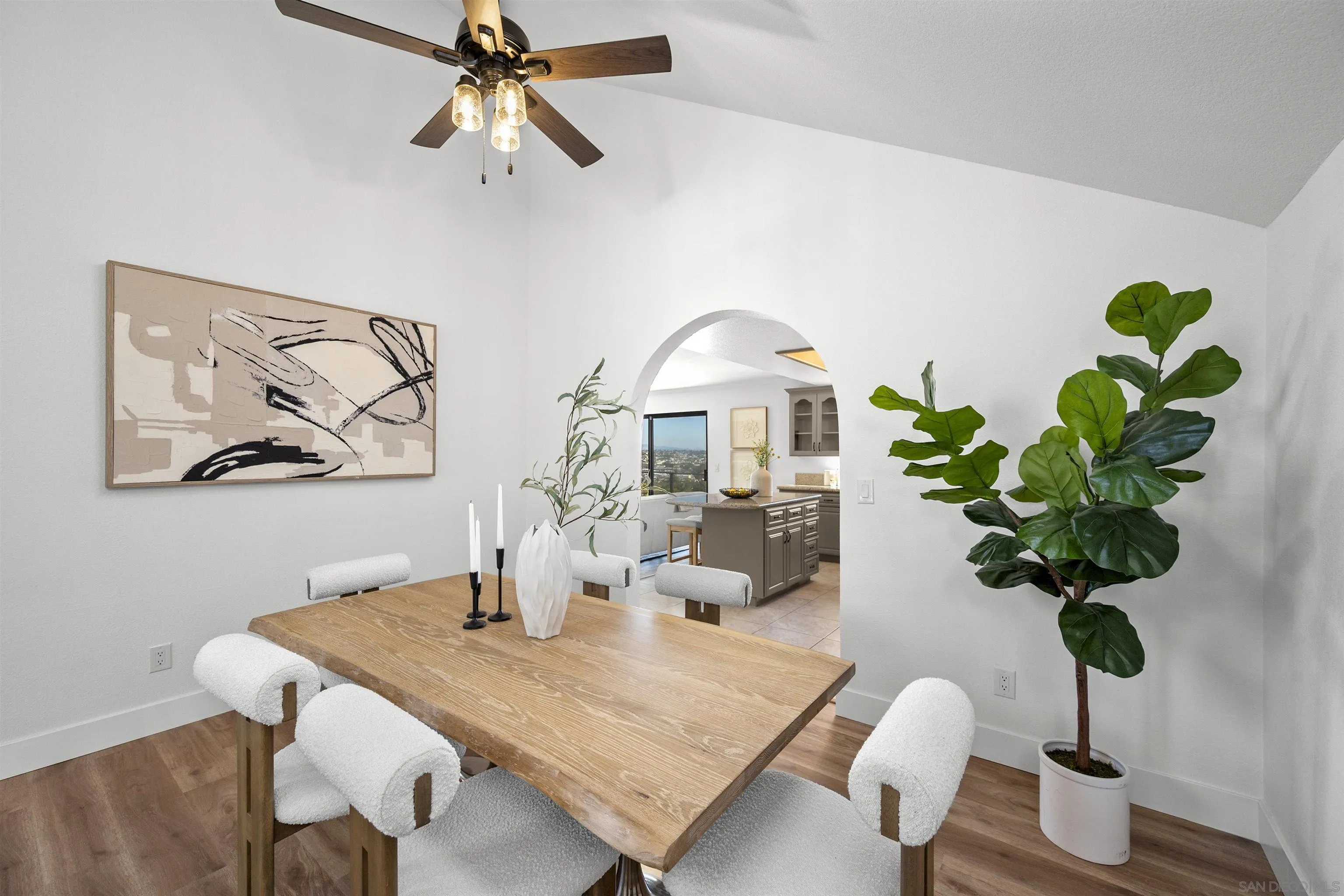2431 Wilbur Avenue San Diego, CA 92109 - Photo 18 of 56 a view of a dining room with furniture and wooden floor