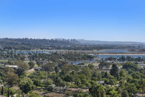an aerial view of residential house and green space