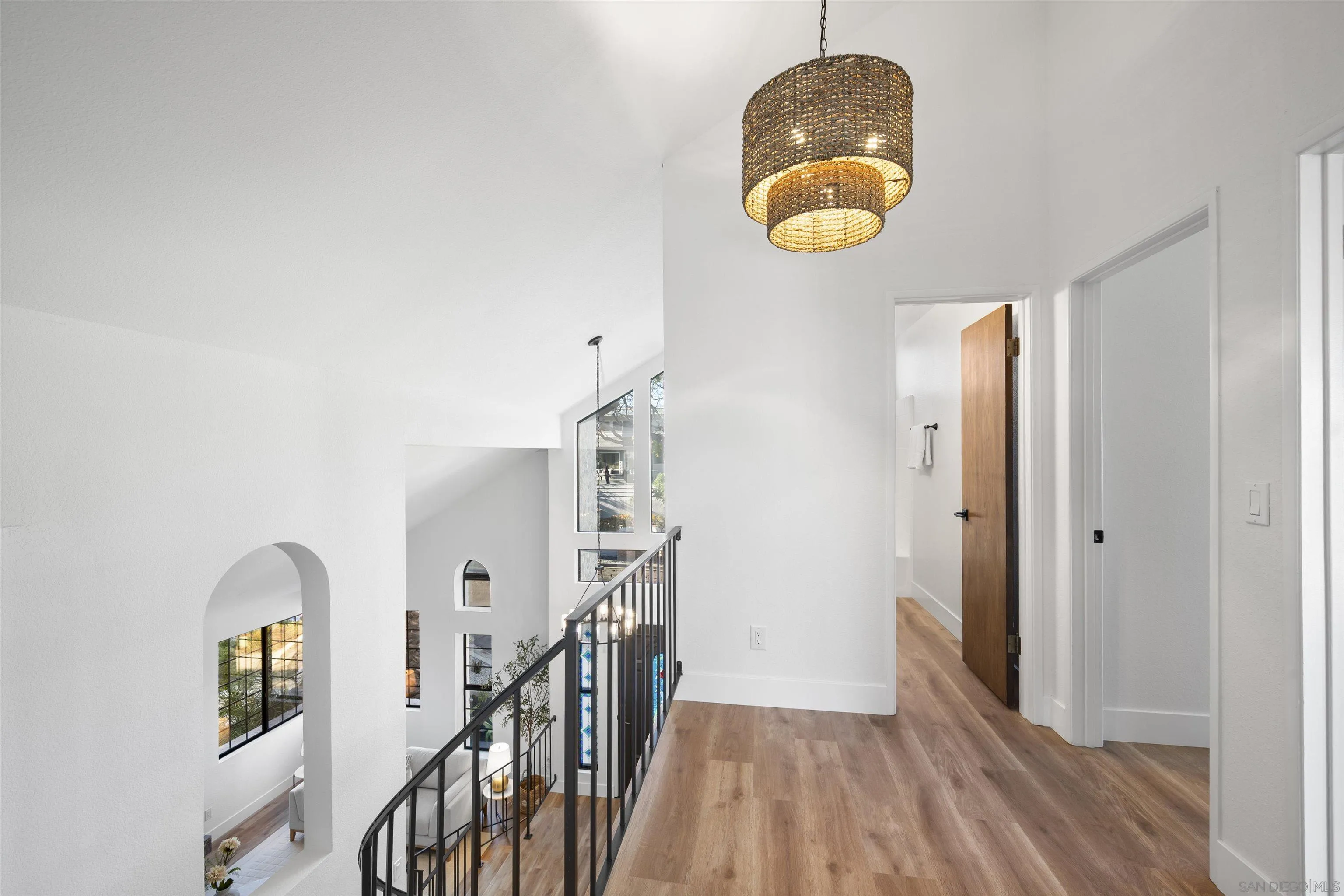 2431 Wilbur Avenue San Diego, CA 92109 - Photo 29 of 56 a view of entryway with kitchen and chandelier fan