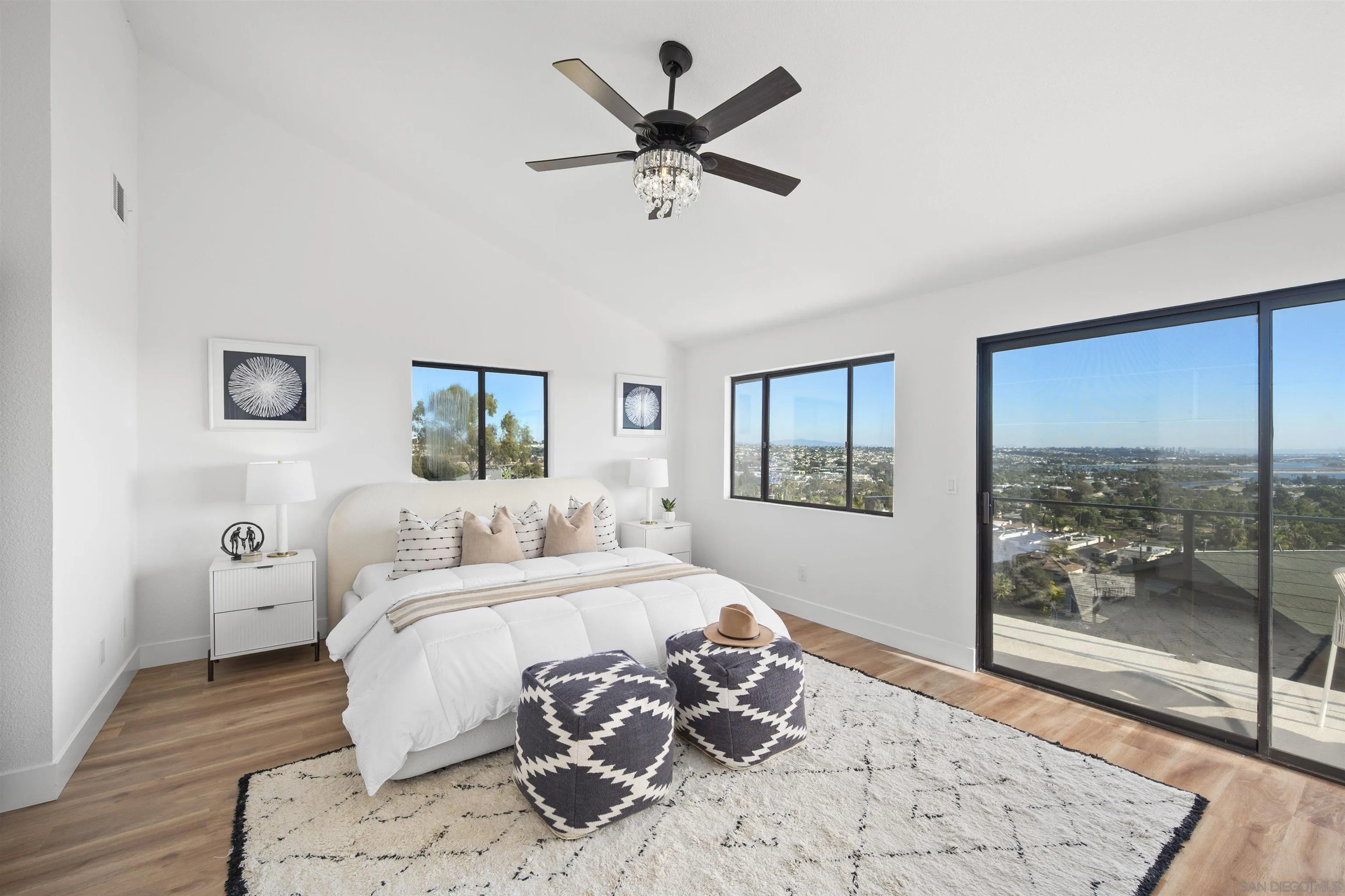 2431 Wilbur Avenue San Diego, CA 92109 - Photo 35 of 56 a bedroom with a bed and window