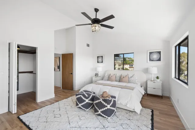 a bathroom with a granite countertop shower curtain