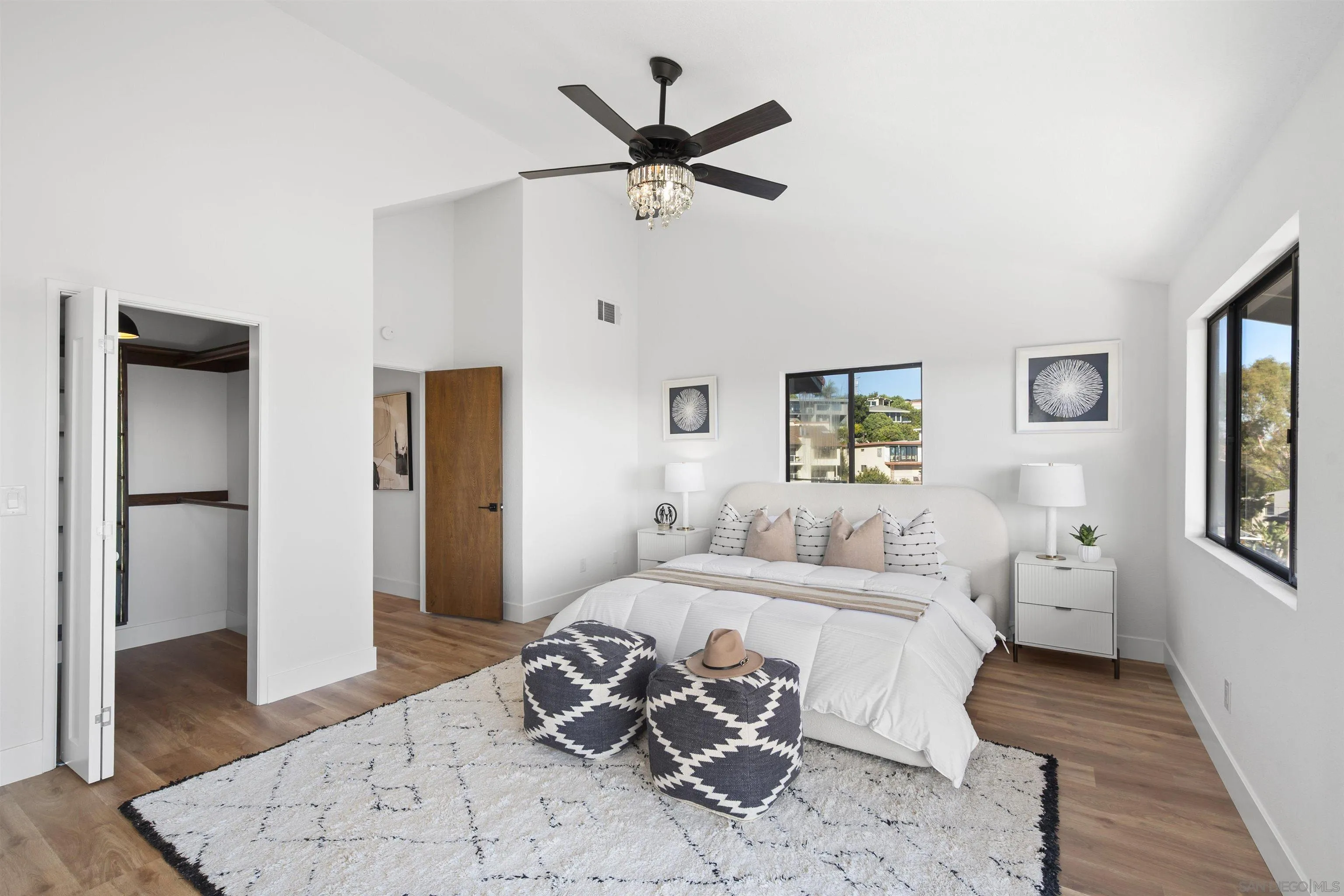 2431 Wilbur Avenue San Diego, CA 92109 - Photo 36 of 56 a bed room with a bed and a couch