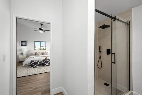 a view of a house and wooden balcony