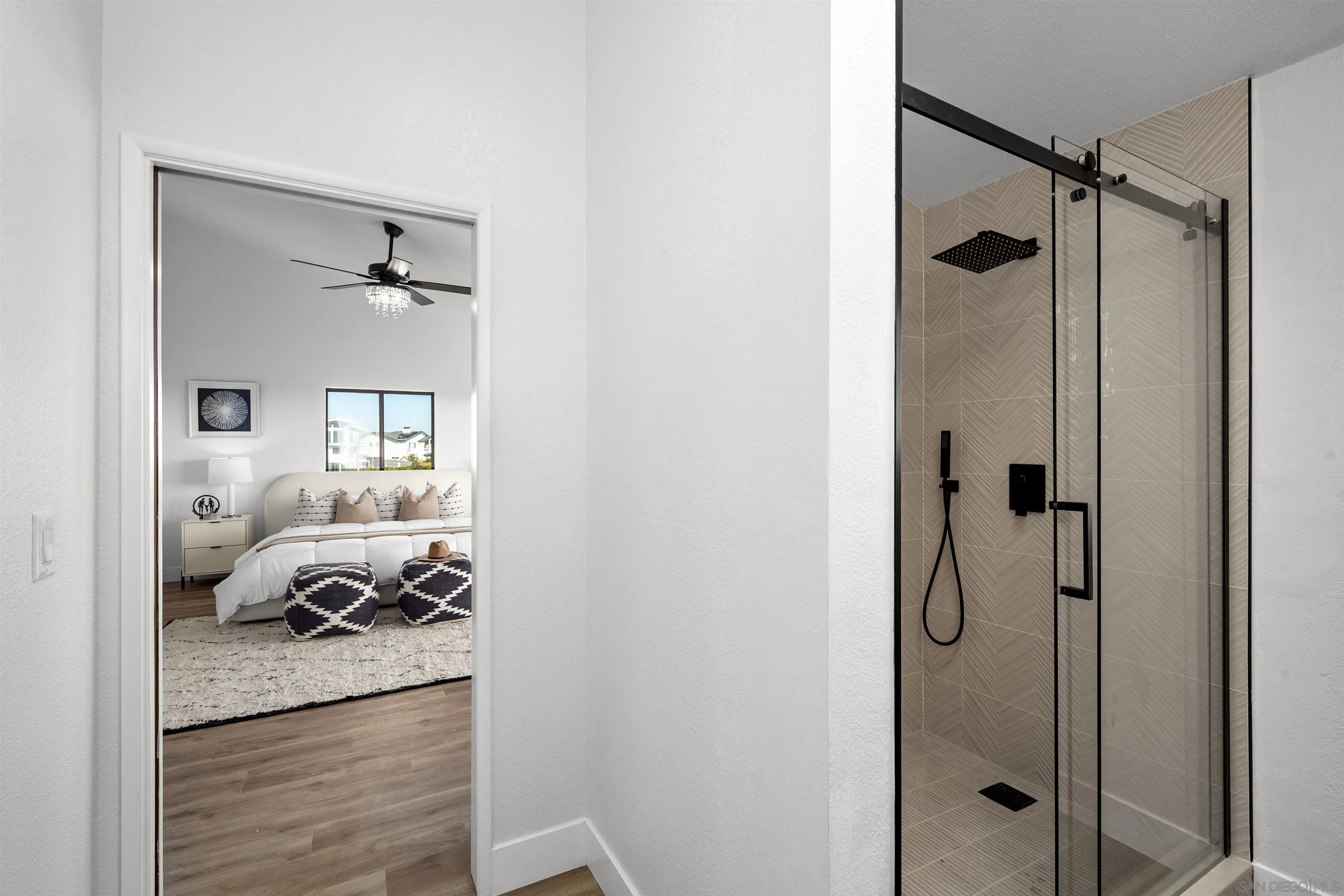 2431 Wilbur Avenue San Diego, CA 92109 - Photo 39 of 56 a bathroom with a granite countertop shower curtain