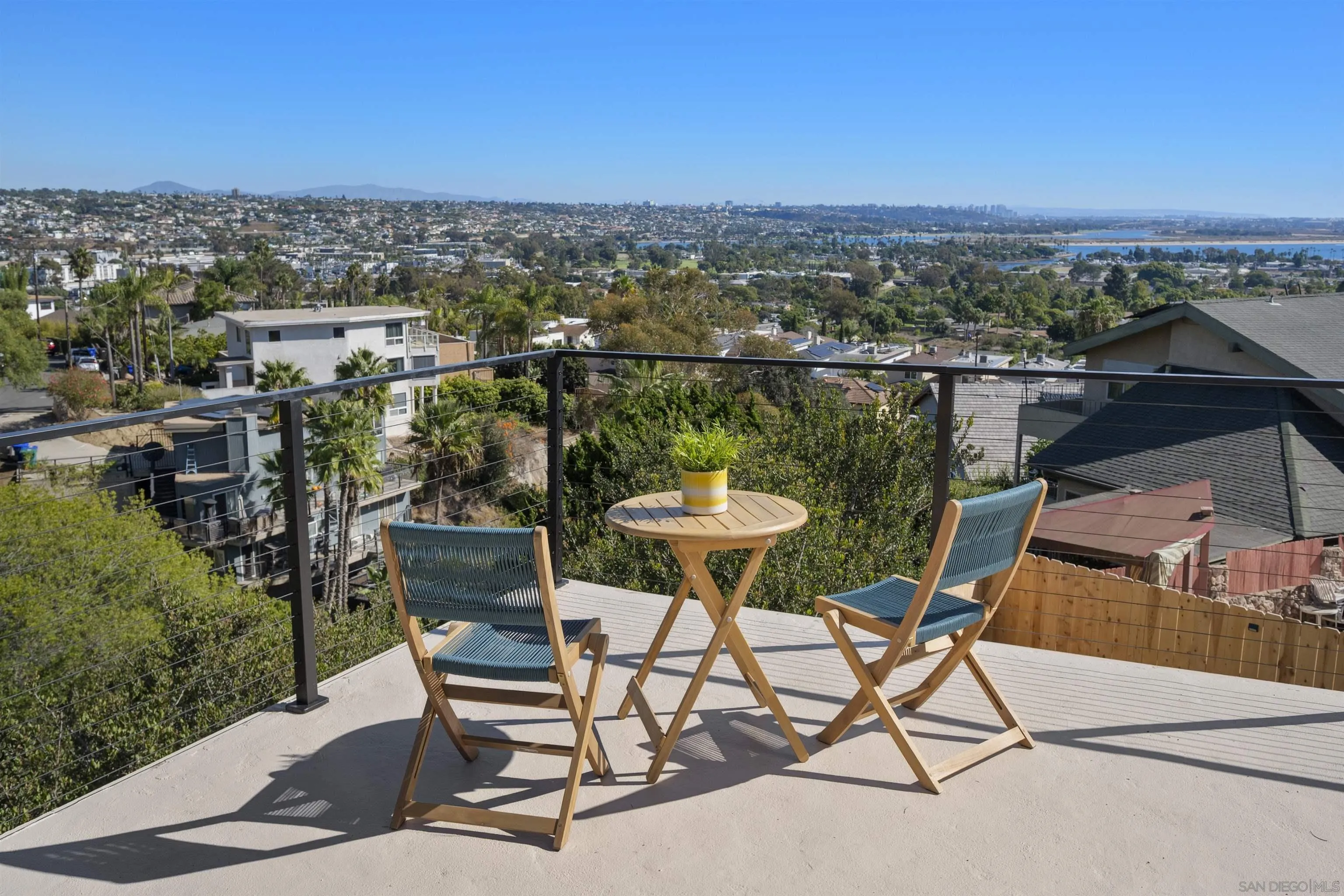 2431 Wilbur Avenue San Diego, CA 92109 - Photo 46 of 56 a view of a chairs and table in patio