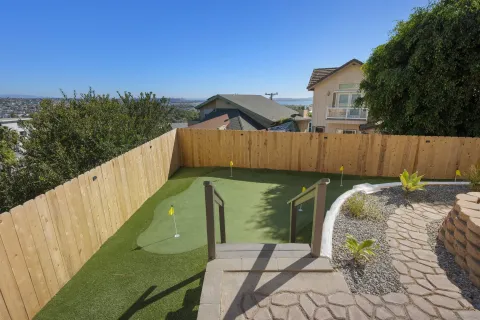 a kitchen with a sink cabinets and window
