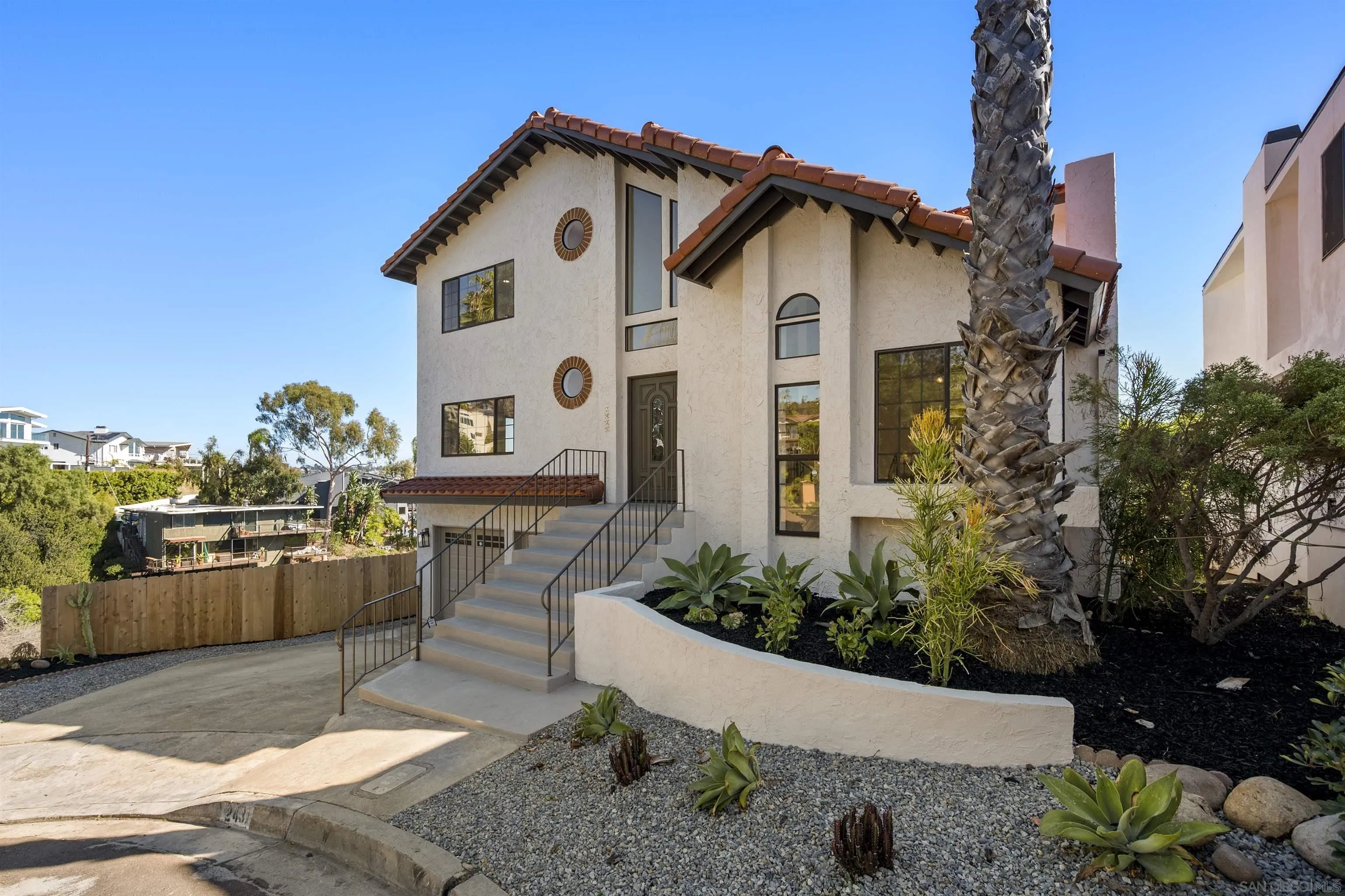 2431 Wilbur Avenue San Diego, CA 92109 - Photo 6 of 56 a view of a chairs and tables in the patio