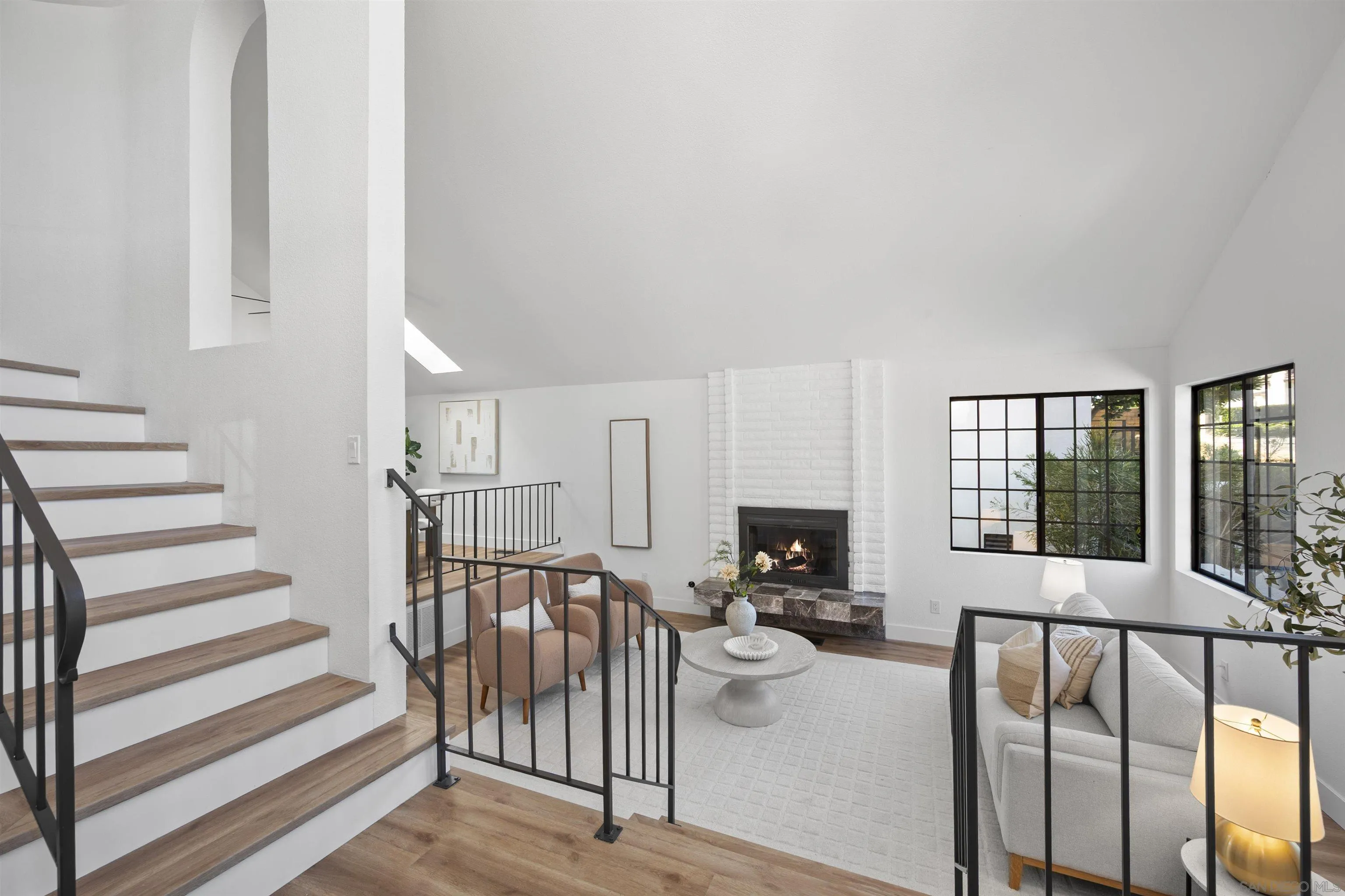 2431 Wilbur Avenue San Diego, CA 92109 - Photo 9 of 56 a view of a livingroom with furniture and hardwood floor