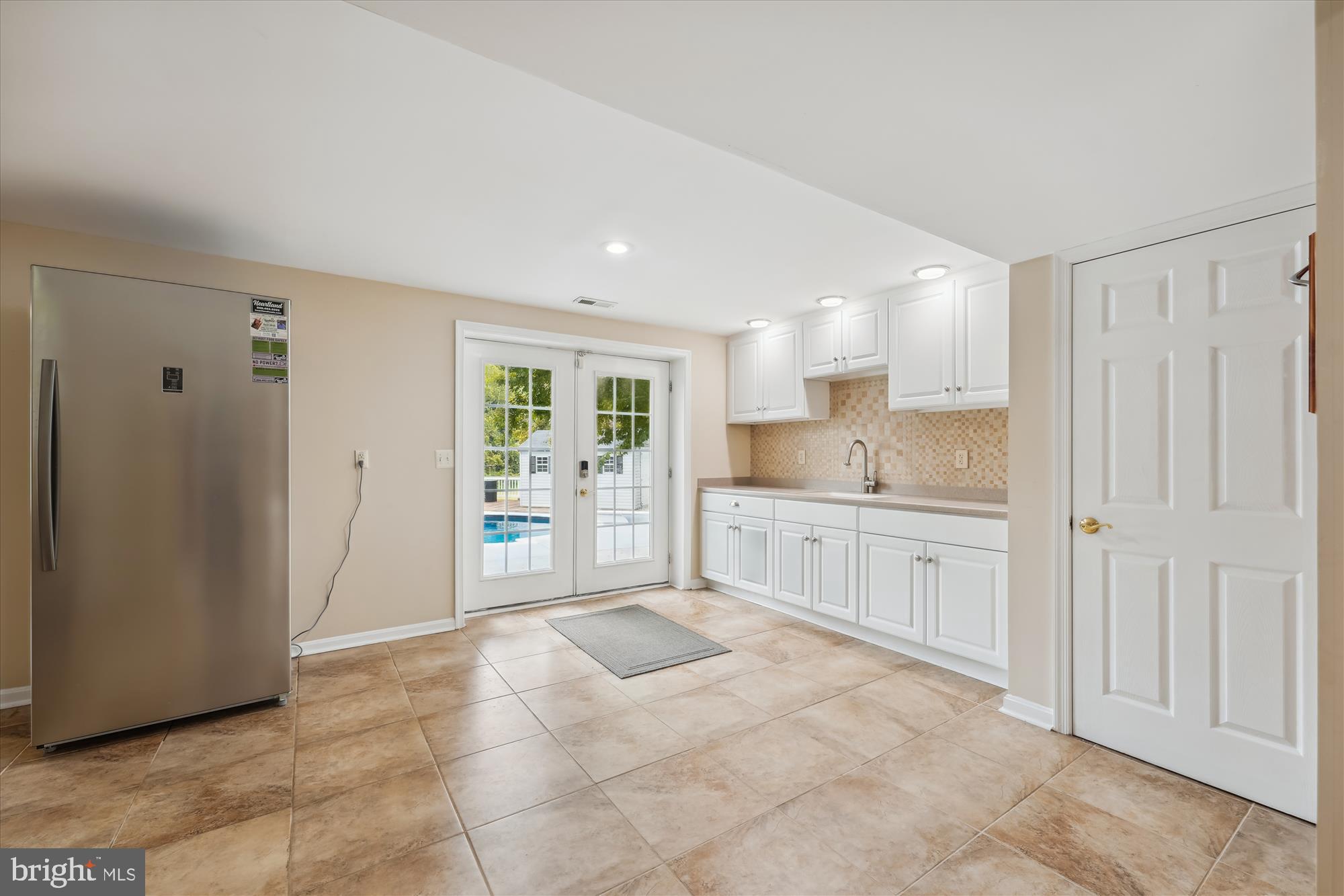 5265 Celestial Lane Waldorf, MD 20601 - Photo 69 of 111 Walk out Basement to Patio and Pool Area / Wet Bar