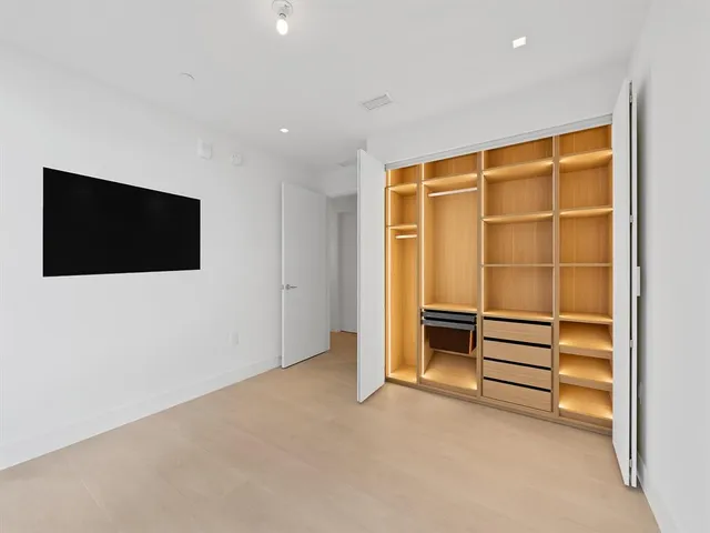 a view of a balcony with chairs