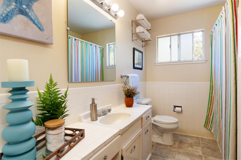 771 Seacliff Drive Aptos, CA 95003 - Photo 11 of 26 a bathroom with a sink toilet and shower