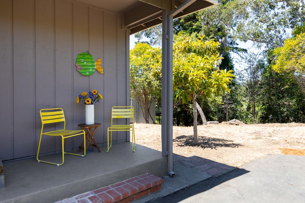 771 Seacliff Drive Aptos, CA 95003 - Photo 15 of 26 a outdoor space with chairs and a potted plant