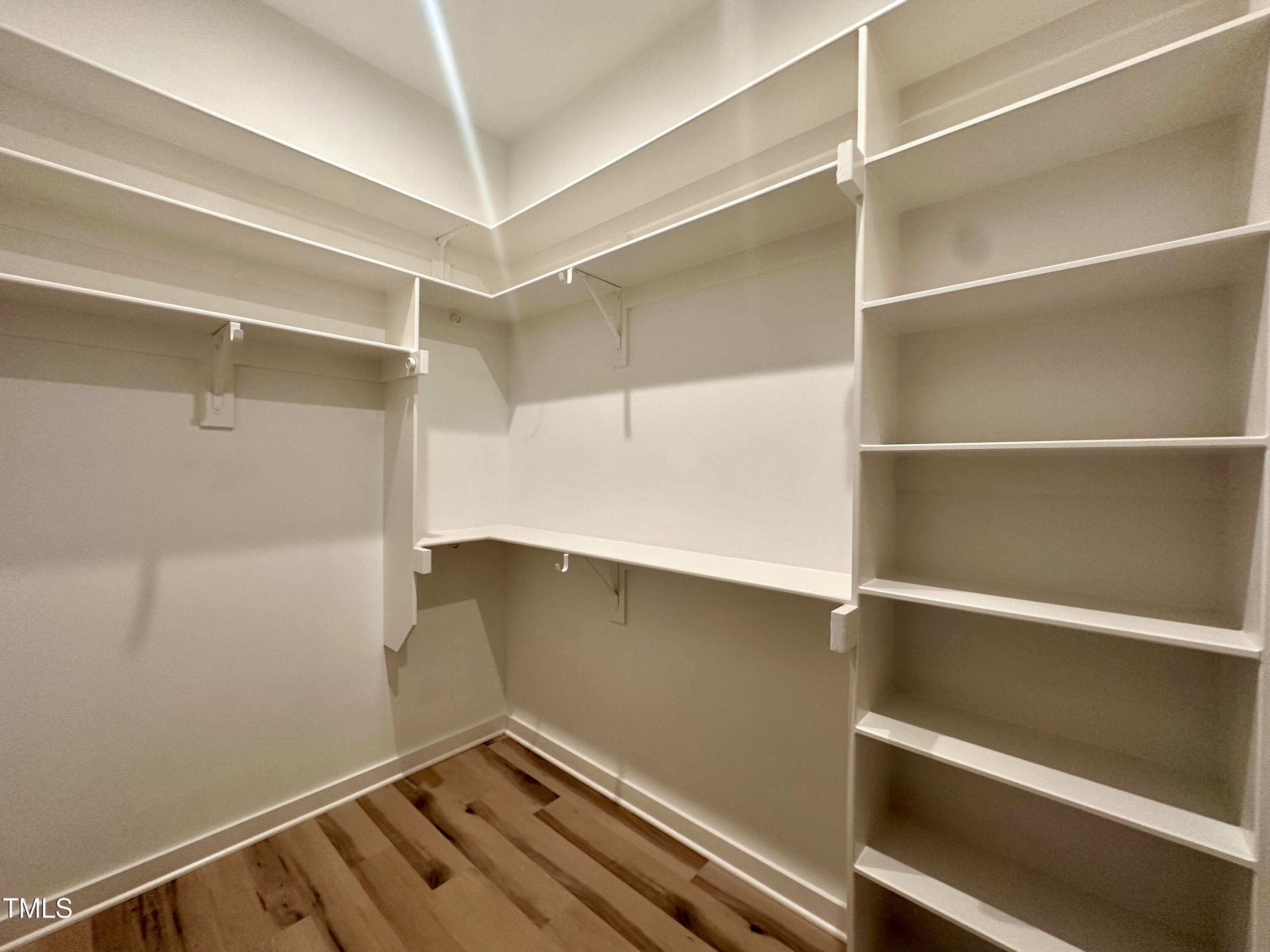1521 Havenmont Court Raleigh, NC 27608 - Photo 15 of 36 a room with walk in closet