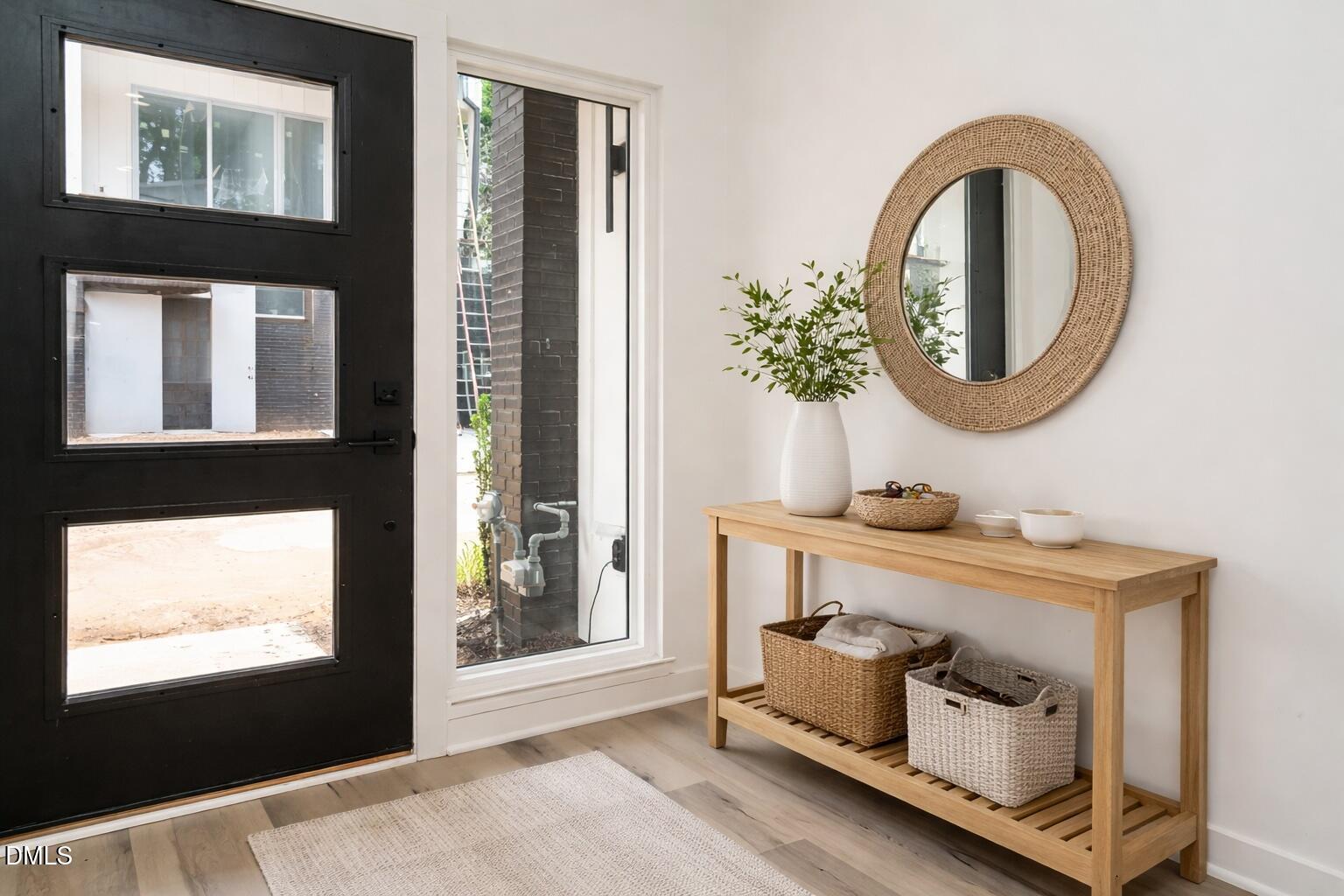 1521 Havenmont Court Raleigh, NC 27608 - Photo 8 of 36 a bathroom with a mirror and a window